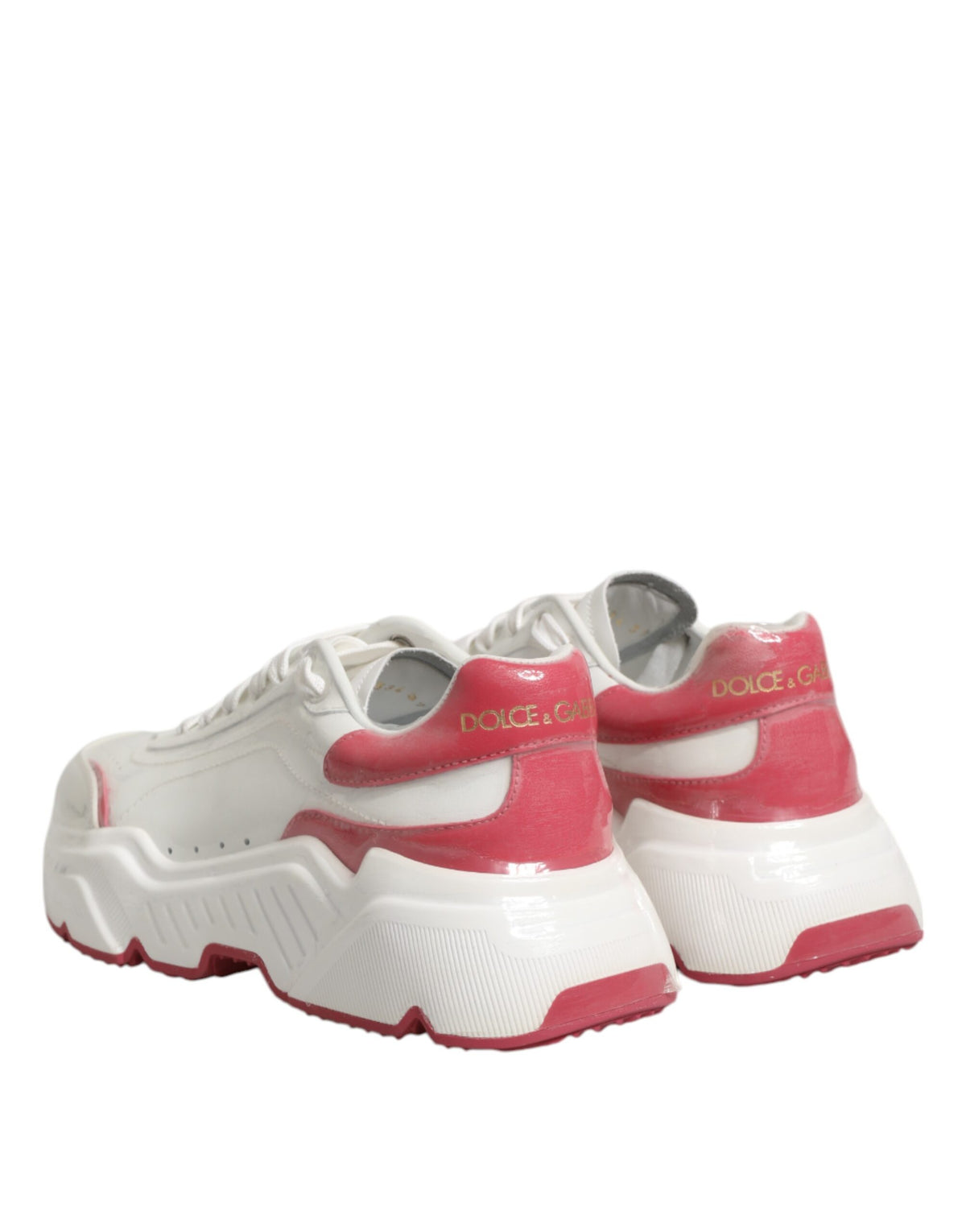 Experience the allure of Dolce & Gabbana's White Pink Daymaster Sneakers, where exquisite calf leather meets timeless elegance, perfect for the discerning fashionista.