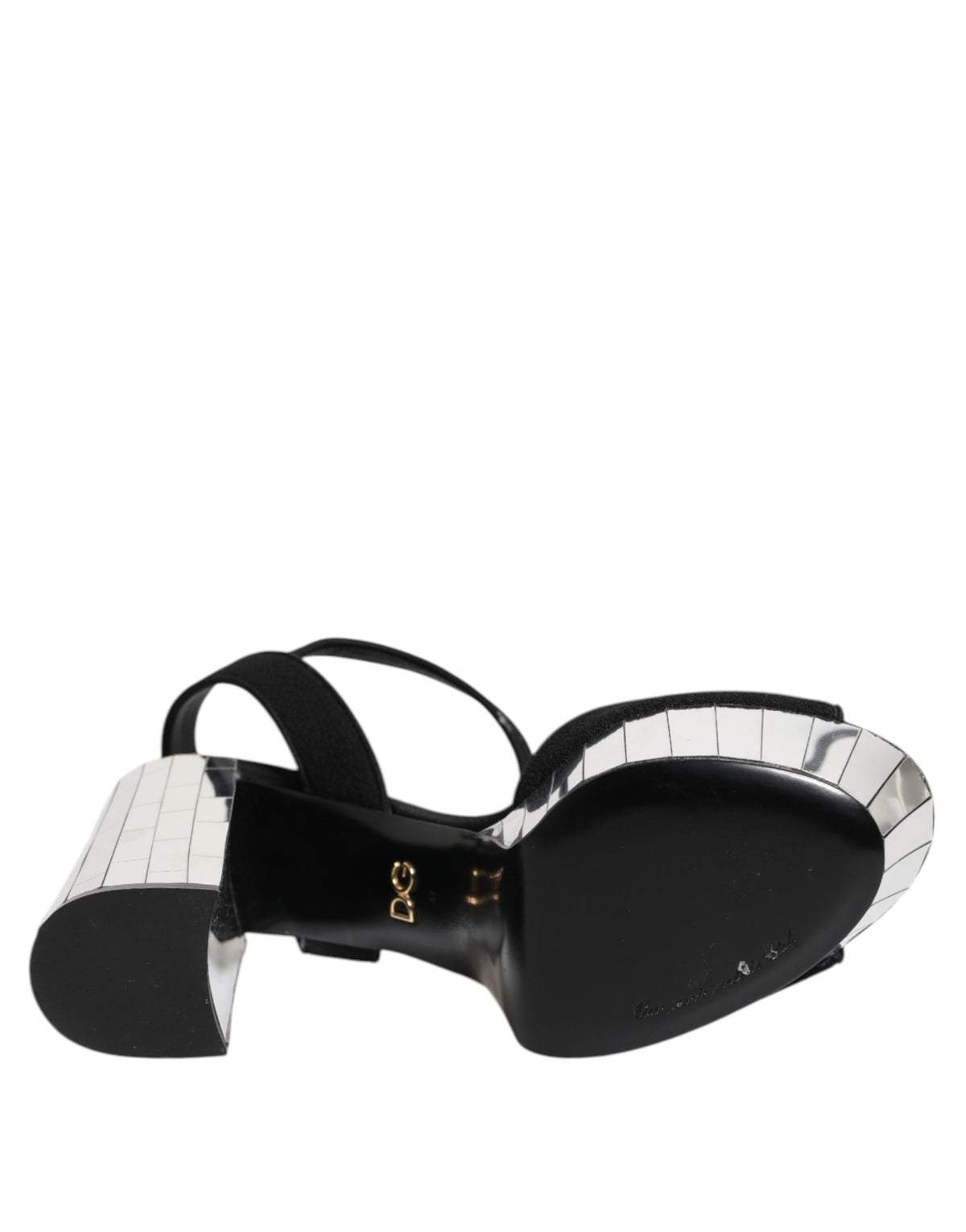 Step into elegance with Dolce & Gabbana's Black Crystal Ankle Strap Keira Sandals, where luxurious materials and exquisite craftsmanship define your sophisticated allure.