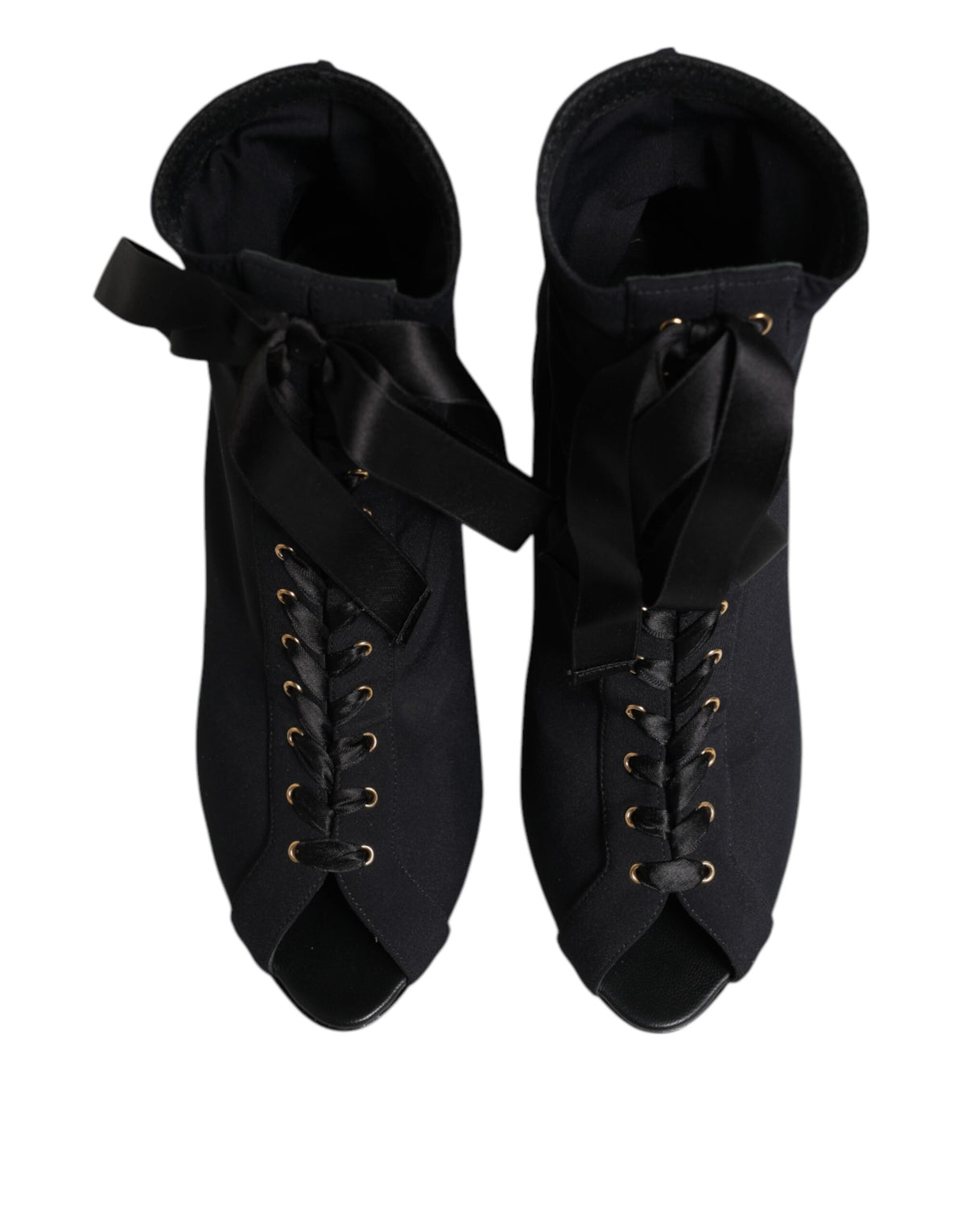 Indulge in the exquisite Dolce & Gabbana Black Stiletto Heels Lace Up Boots, where Italian craftsmanship meets luxurious design, elevating your style with every step.