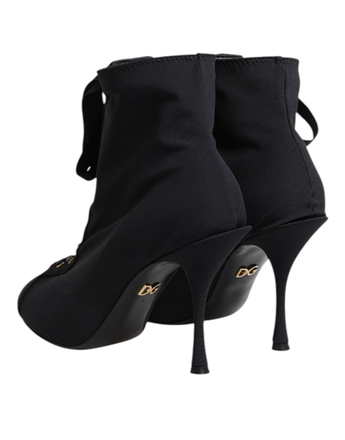 Step into a realm of elegance with Dolce & Gabbana's Black Stiletto Heels Lace Up Boots, crafted in Italy from luxurious materials, embodying sophistication and allure.