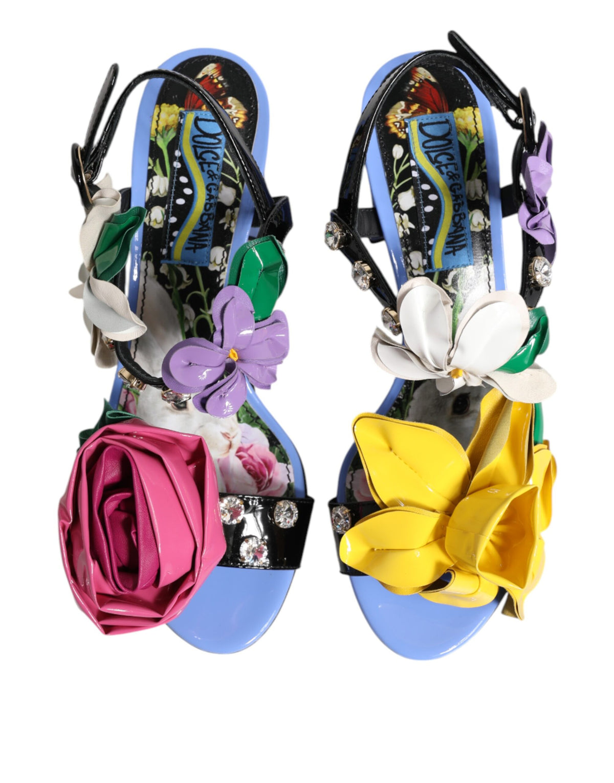 Step into a world of elegance with Dolce & Gabbana's KEIRA Sandals, crafted from sumptuous lambskin leather and adorned with exquisite floral crystals, embodying luxury and artistry.