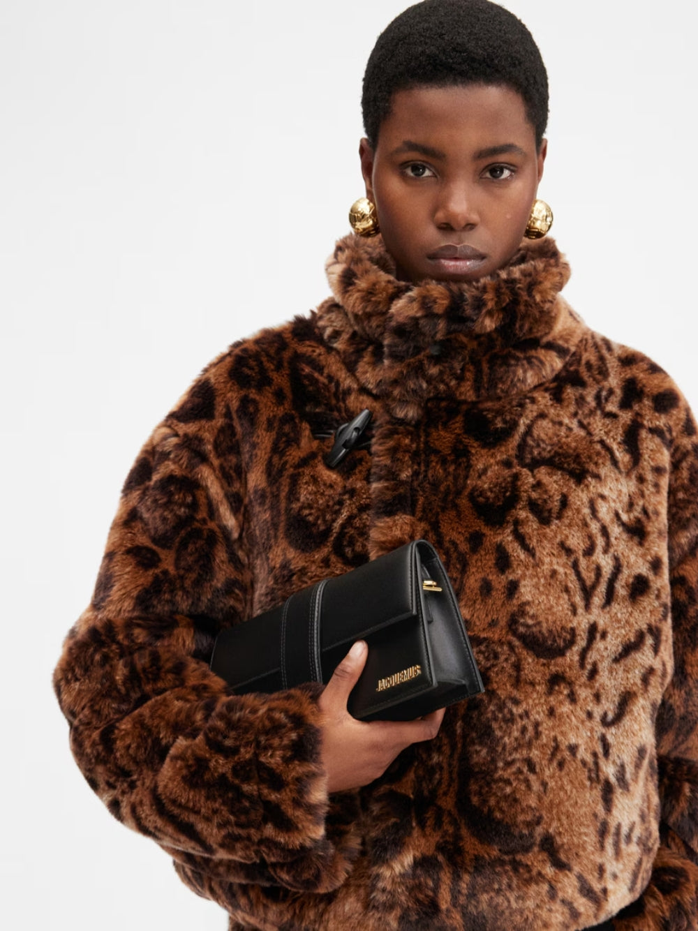 Discover the Jacquemus Black Leather Le Bambino Long, a symbol of timeless elegance and artisanal craftsmanship, designed for those who embody luxury and sophistication.