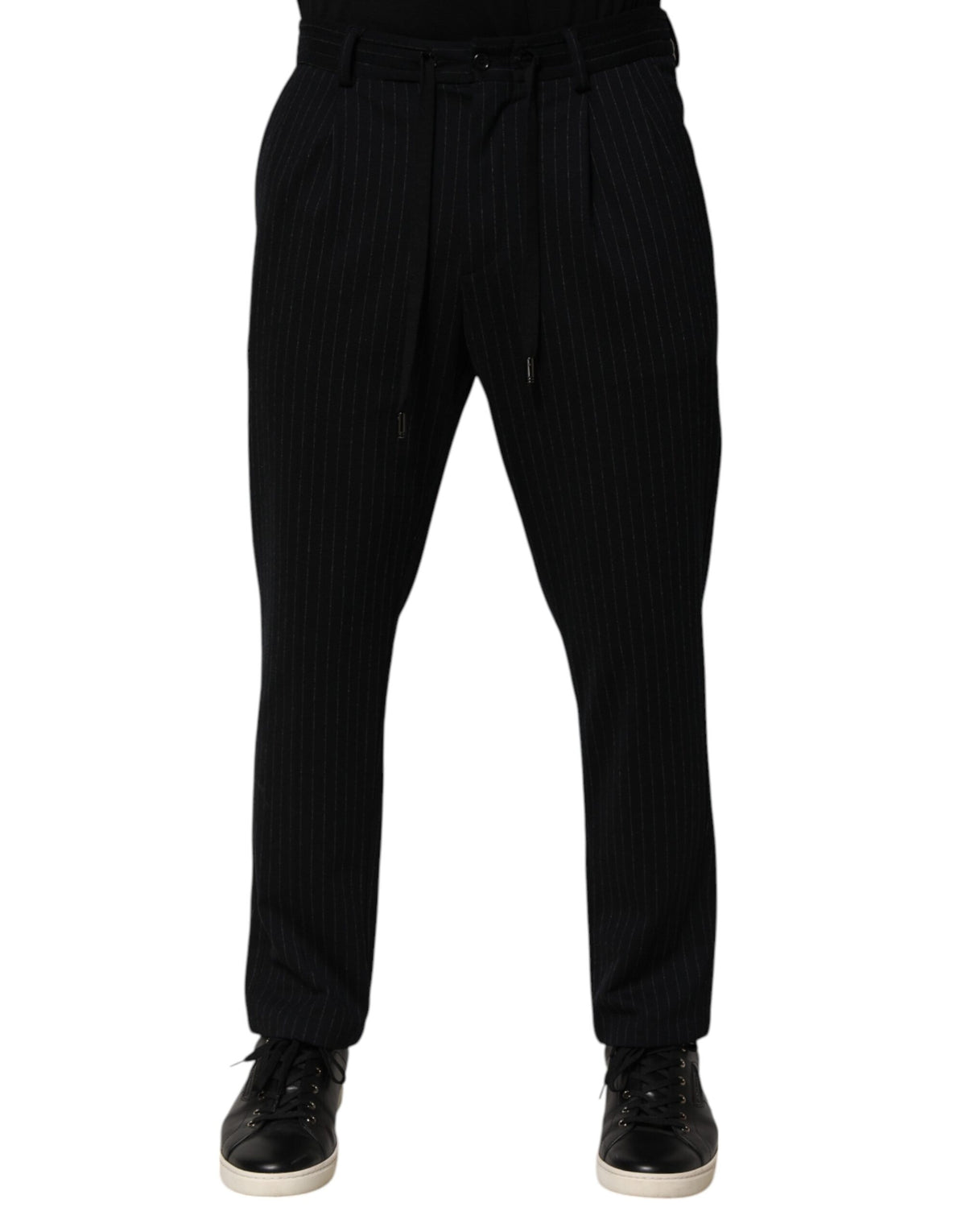 Experience the allure of Dolce & Gabbana's Black Stripes Viscose Skinny Dress Men Pants, where exquisite craftsmanship meets contemporary elegance for the discerning fashionista.