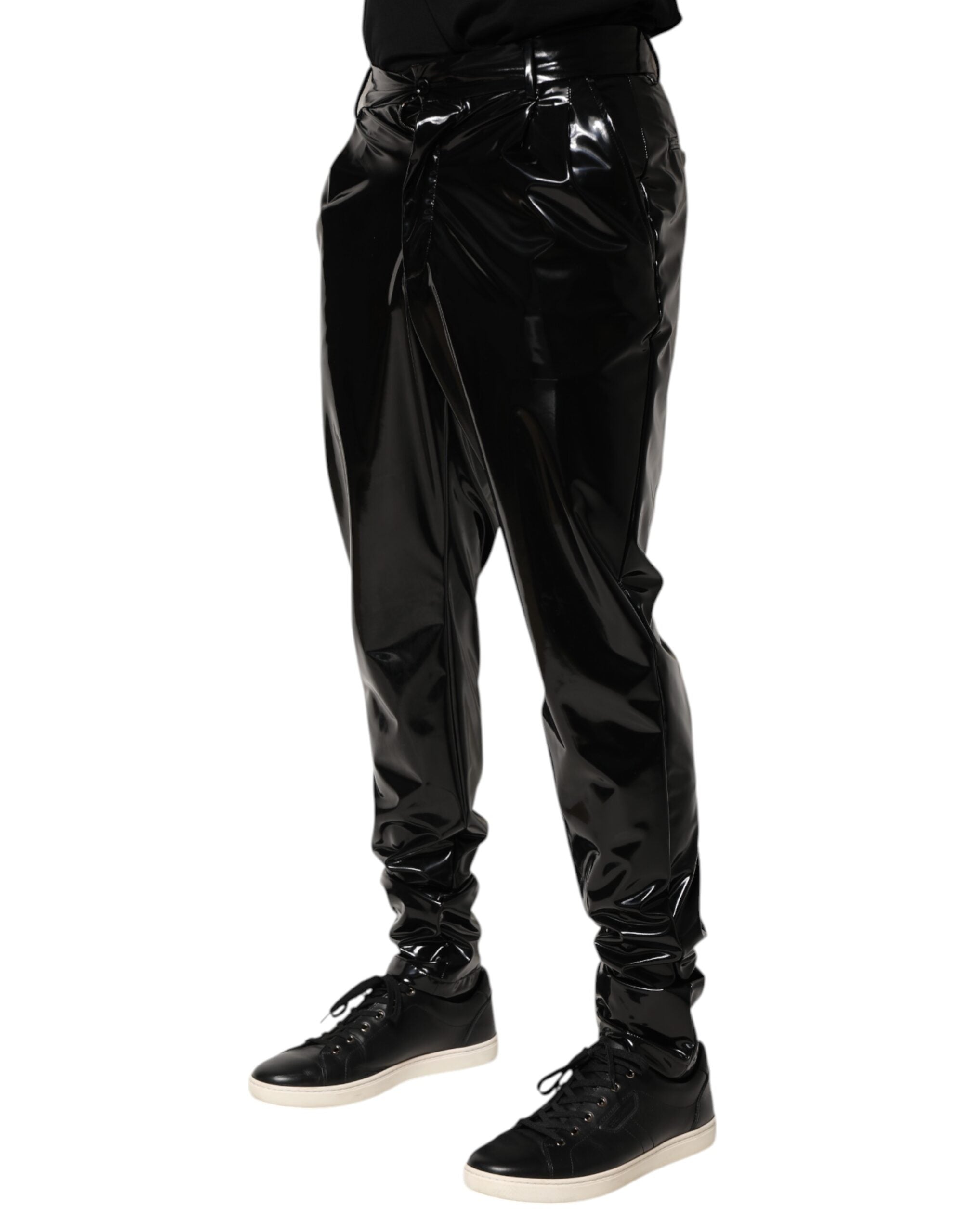 Elevate your wardrobe with Dolce & Gabbana's Black Polyester Mid Waist Trouser Pants, crafted in Italy for a timeless blend of luxury and sophistication.