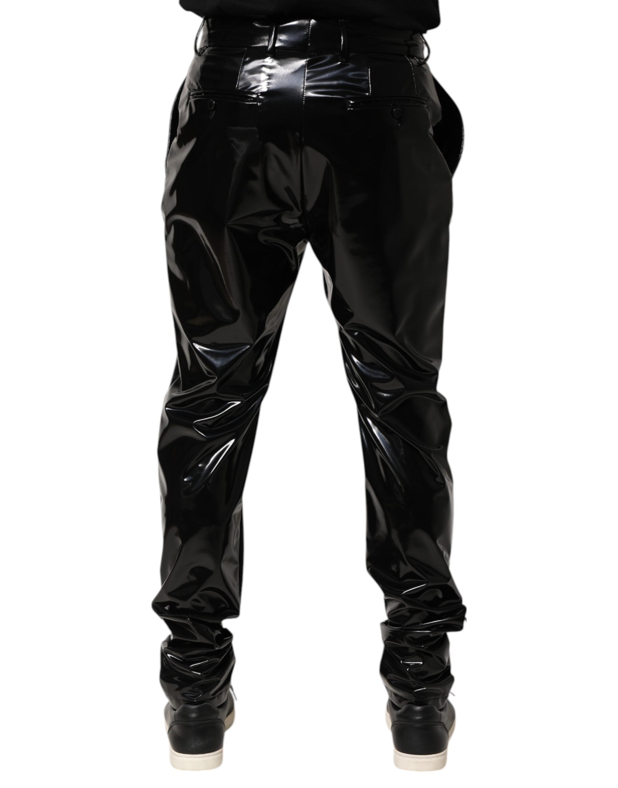 Indulge in the exquisite Dolce & Gabbana Black Polyester Mid Waist Trouser Pants, crafted in Italy for timeless elegance and unparalleled comfort, perfect for any sophisticated wardrobe.
