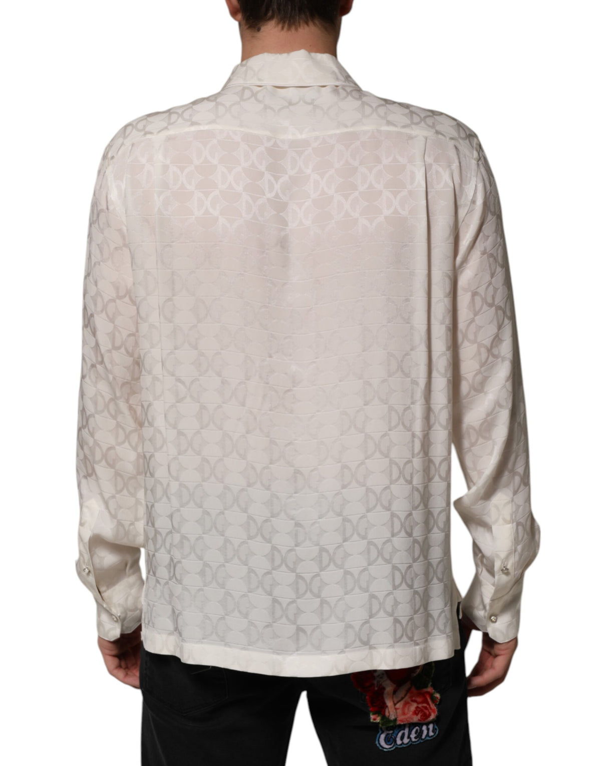 Indulge in the exquisite Dolce & Gabbana White Silk DG Logo Print Long Sleeves Shirt, a masterpiece of Italian craftsmanship that embodies timeless elegance and sophistication.