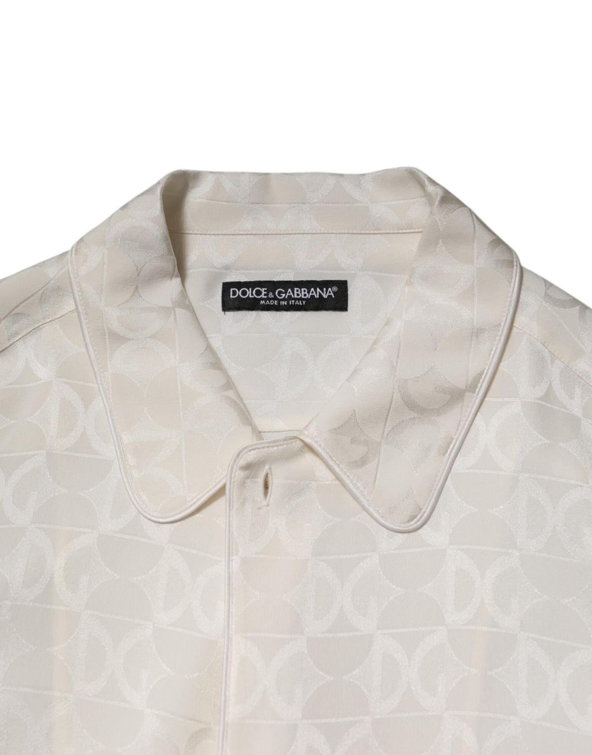 Indulge in the exquisite Dolce & Gabbana White Silk DG Logo Print Long Sleeves Shirt, a symbol of timeless elegance and Italian craftsmanship that elevates your wardrobe.