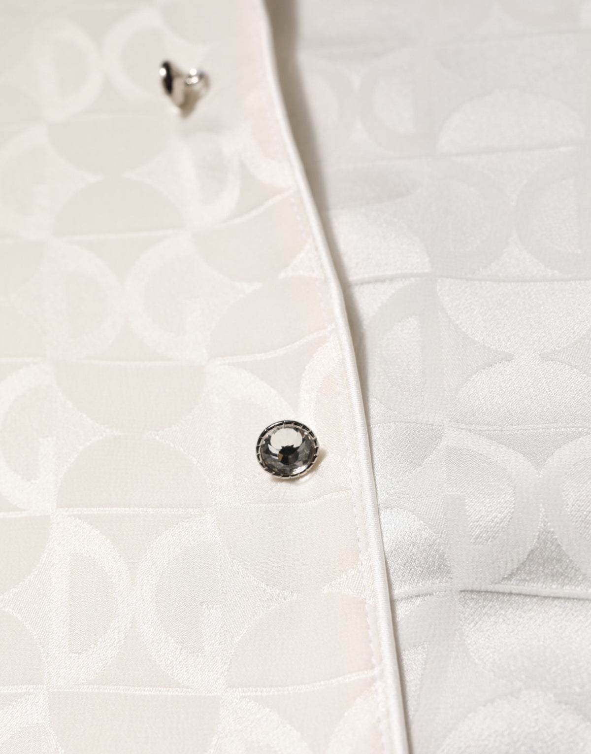 Indulge in the exquisite Dolce & Gabbana White Silk DG Logo Print Long Sleeves Shirt, a timeless masterpiece of Italian craftsmanship that elevates your elegance and sophistication.