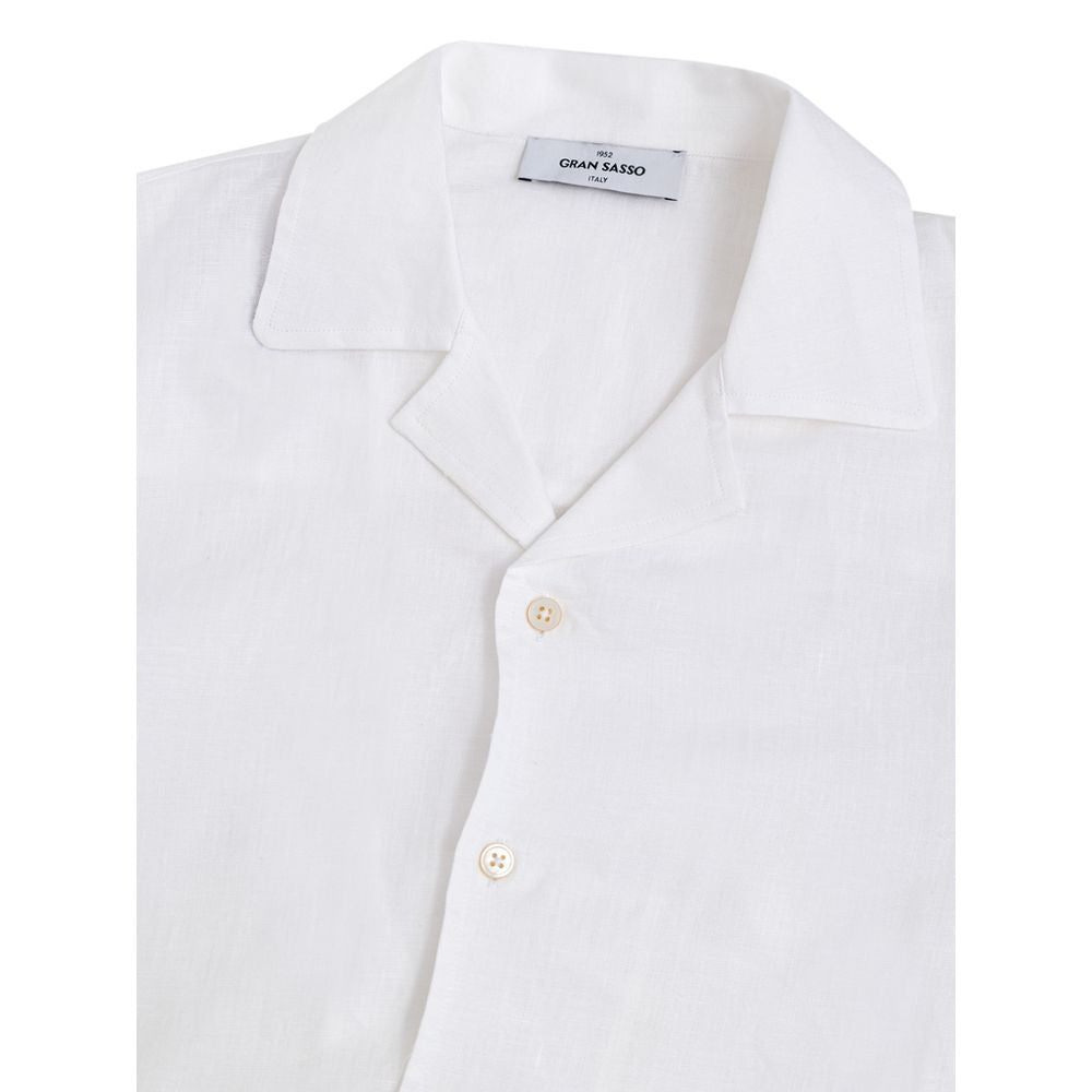 Indulge in the Gran Sasso White Linen Shirt, a masterpiece of artisanal craftsmanship, blending timeless elegance with modern sophistication for the discerning individual.