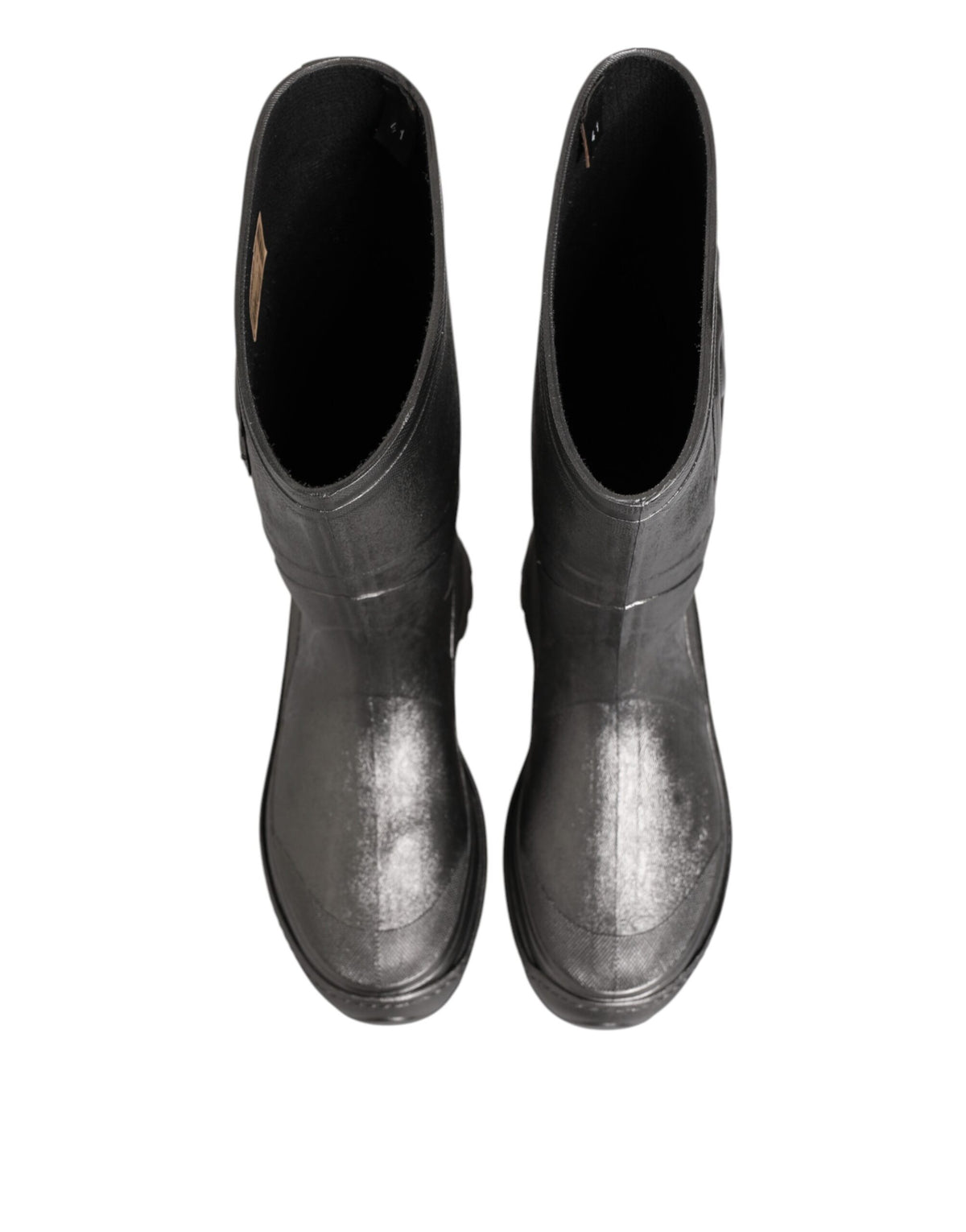 Indulge in the exquisite Dolce & Gabbana Black Argento Pull On Rain Boots, crafted from premium waterproof rubber, embodying luxury and sophistication for every occasion.