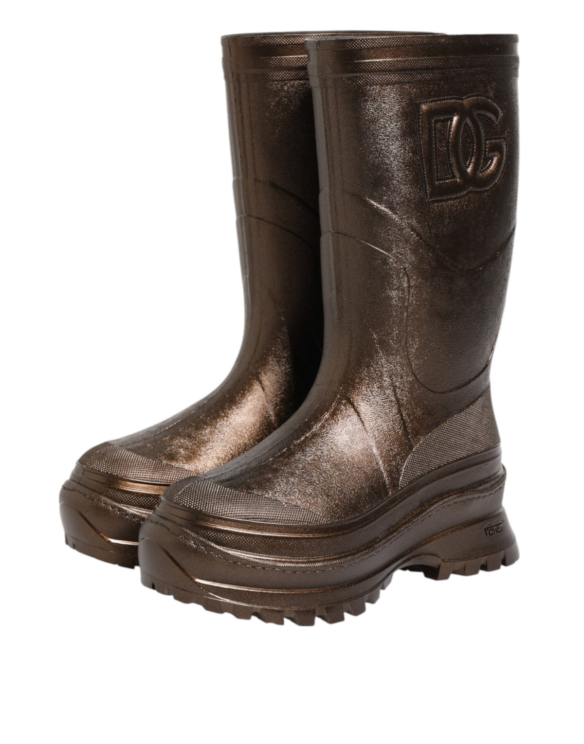 Indulge in the exquisite Dolce & Gabbana Metallic Bronze Pull On Rain Boots, where luxurious rubber craftsmanship meets Italian elegance, perfect for the discerning fashionista.