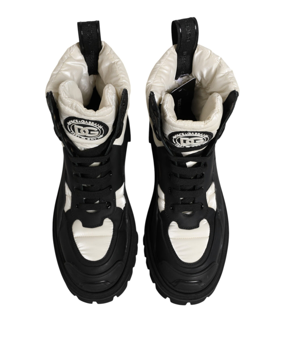 Step into unparalleled elegance with Dolce & Gabbana's Black White Padded Mid Calf Lace Up Boots, crafted in Italy from premium polyester for the discerning individual.