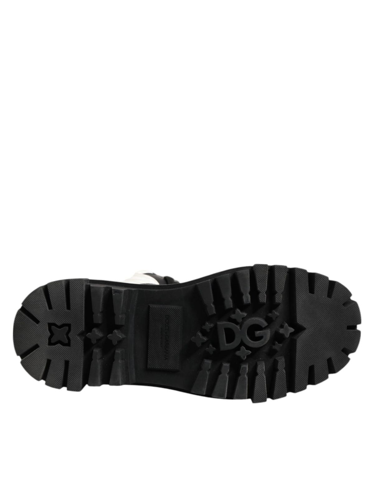 Step into luxury with Dolce & Gabbana's Black White Padded Mid Calf Lace Up Boots, crafted in Italy from premium polyester, embodying bold elegance and exquisite craftsmanship.