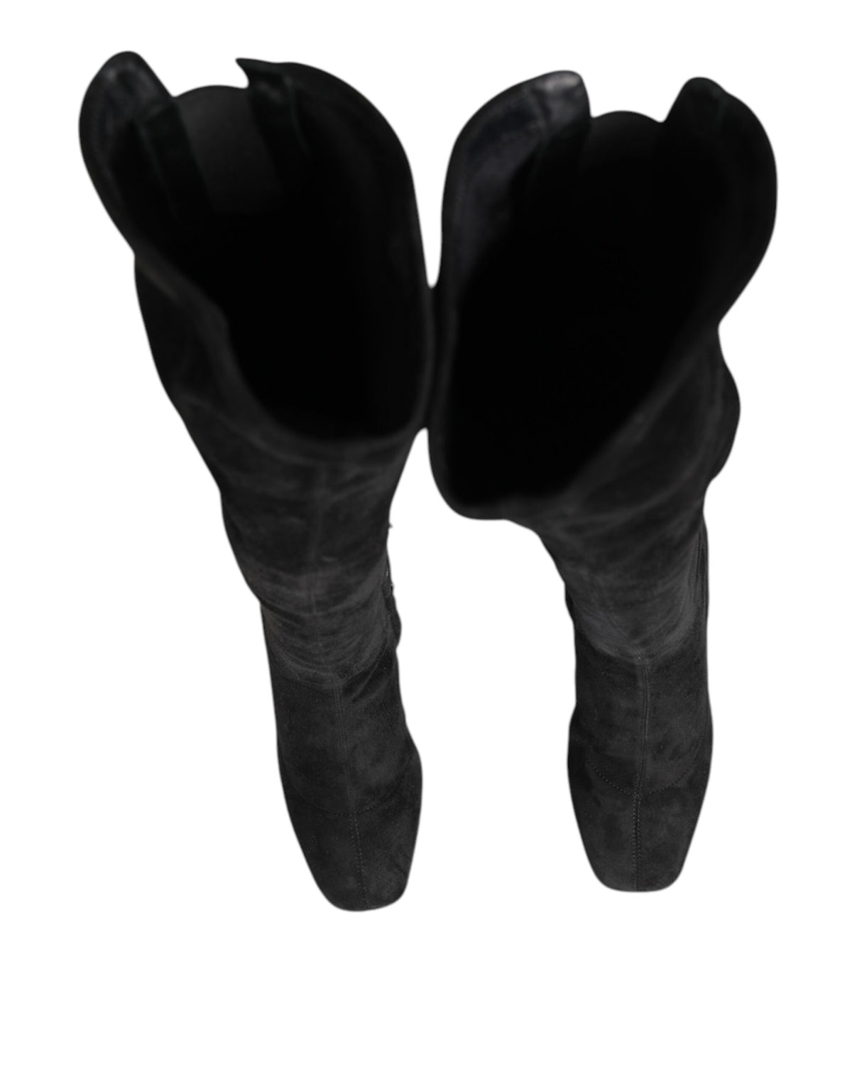 Step into a realm of elegance with Dolce & Gabbana's Black Suede Leather Knee High Boots, crafted from luxurious lamb leather for unparalleled sophistication and comfort.