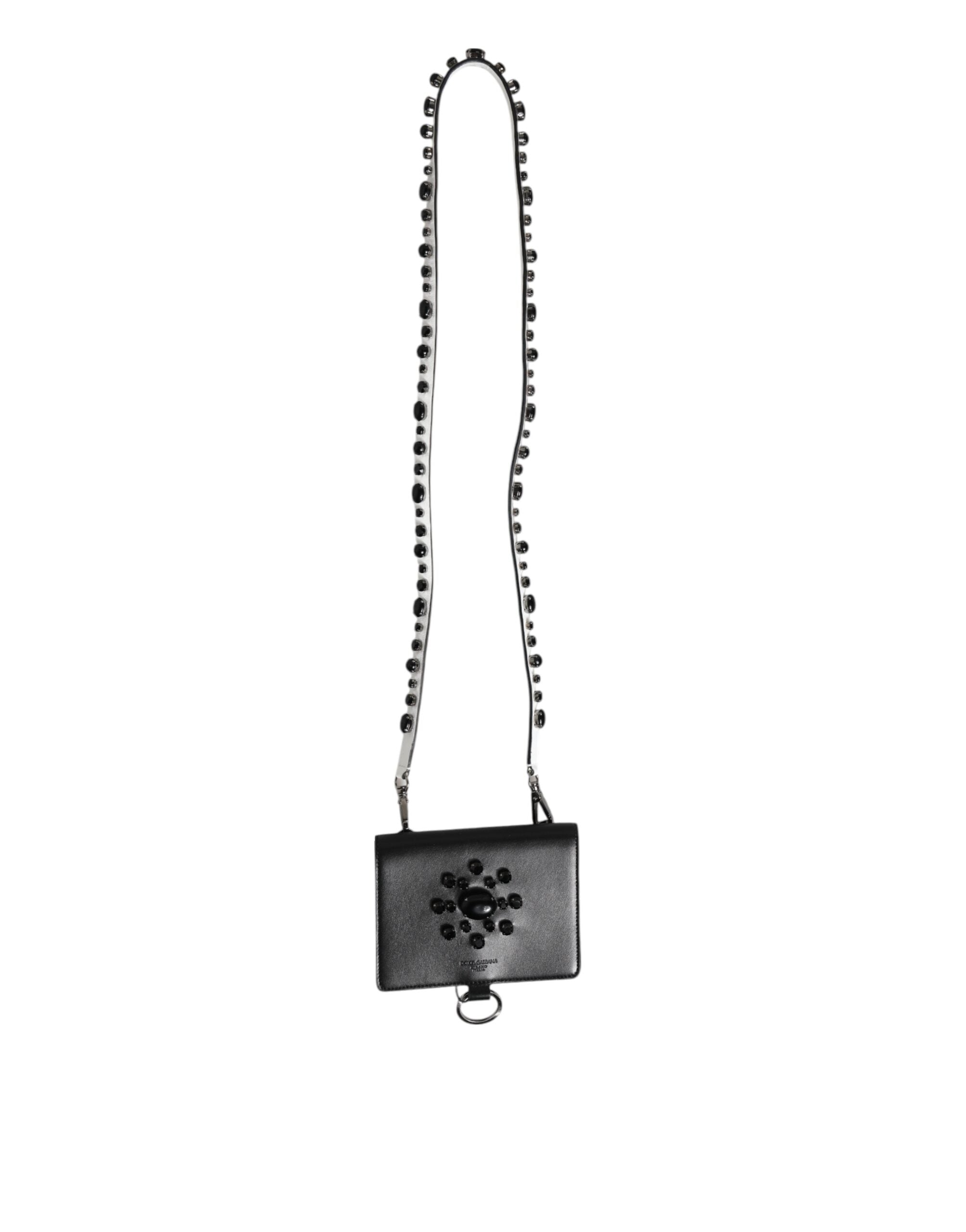 Discover the Dolce & Gabbana Black Leather Crystal Embellished Card Holder Wallet, a symbol of exquisite craftsmanship and luxury, perfect for the discerning individual.