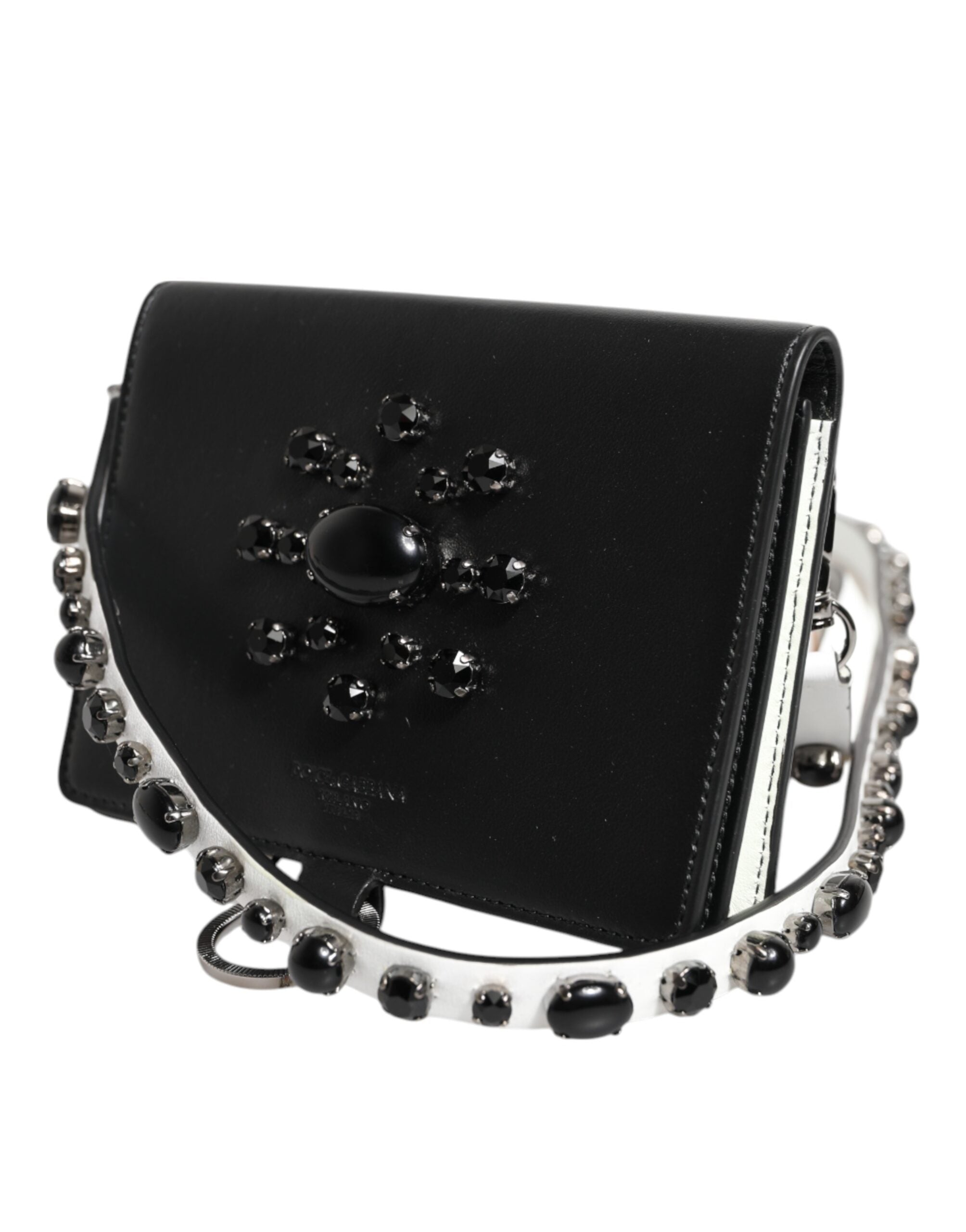 Discover the Dolce & Gabbana Black Leather Crystal Embellished Card Holder Wallet, a masterpiece of Italian craftsmanship that exudes luxury and sophistication.