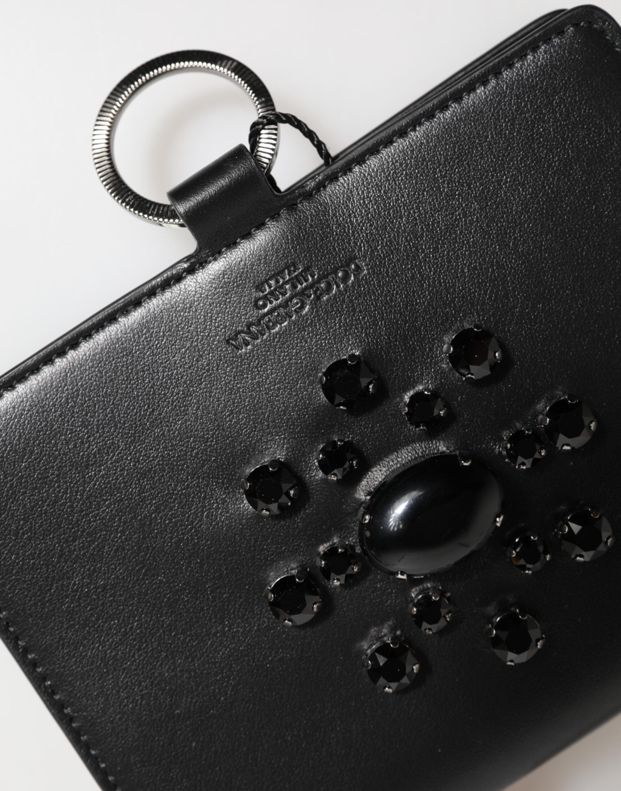 Discover the Dolce & Gabbana Black Leather Crystal Embellished Card Holder Wallet, a symbol of exquisite craftsmanship and luxury, perfect for the discerning individual.