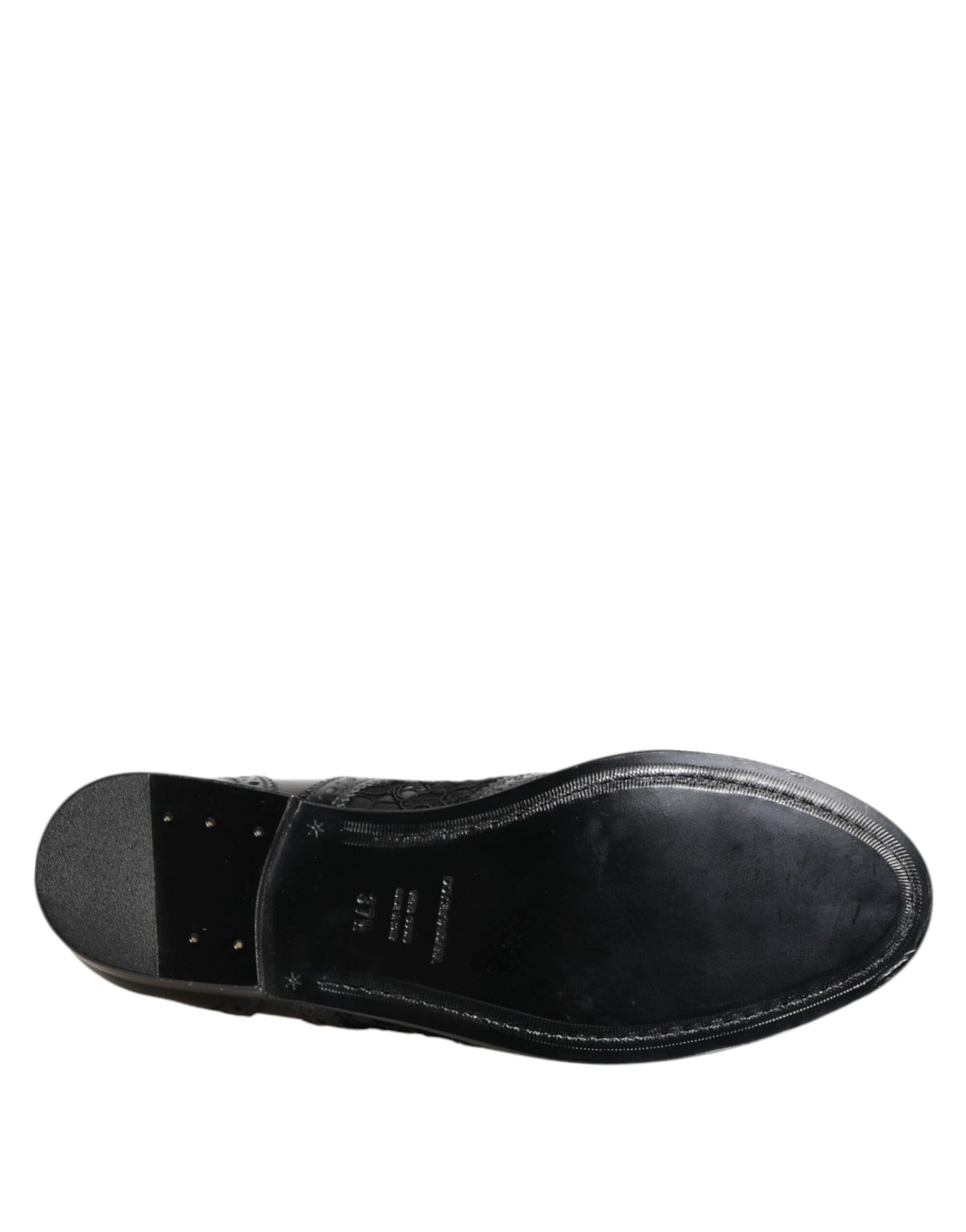 Indulge in the exquisite craftsmanship of Dolce & Gabbana's Black Leather Floral Lace Dress Formal Shoes, where timeless elegance meets luxurious allure for the discerning individual.