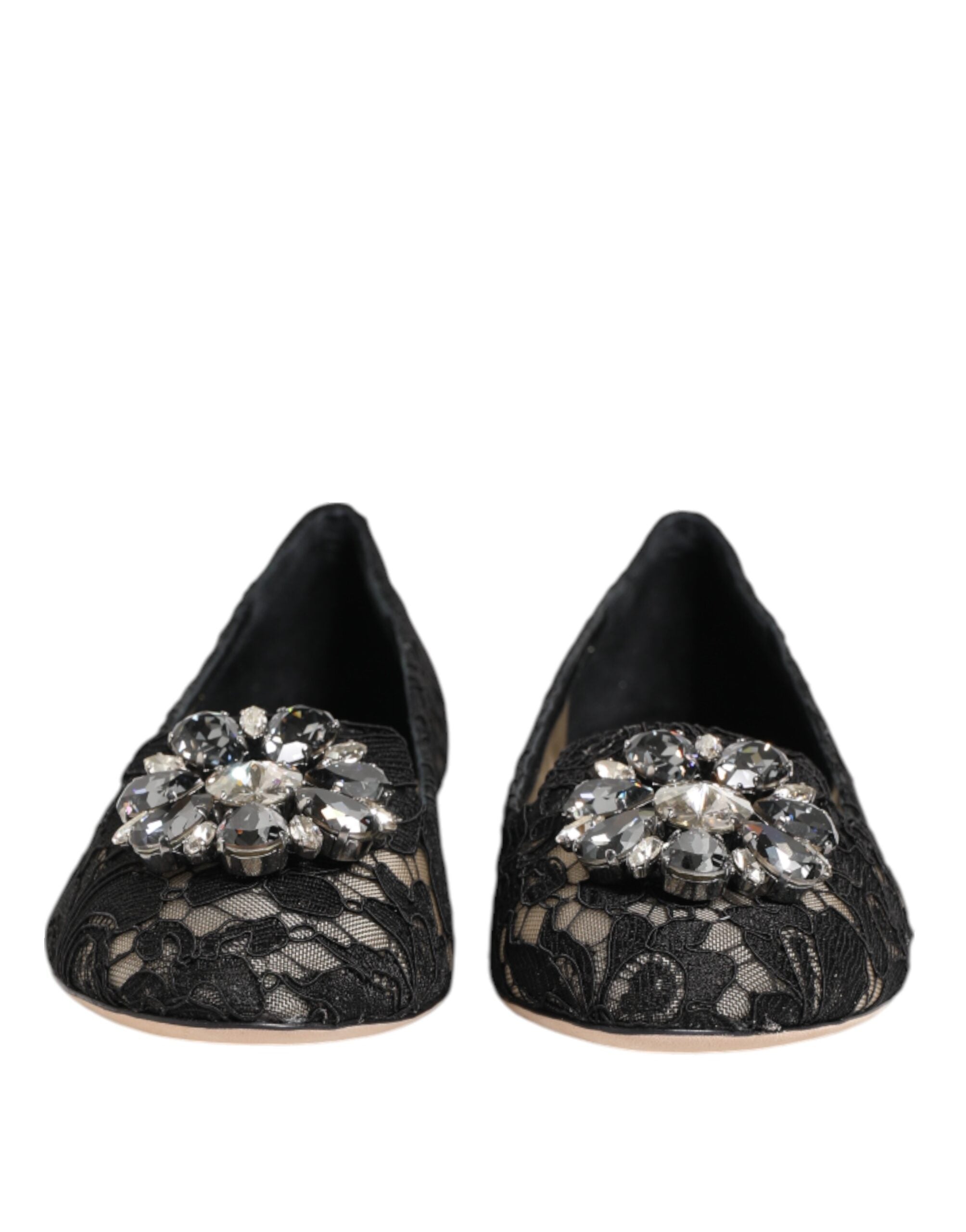 Discover the exquisite Dolce & Gabbana Black Taormina Lace Crystals Flats, where Italian craftsmanship meets luxurious lace and crystal embellishments for timeless elegance.