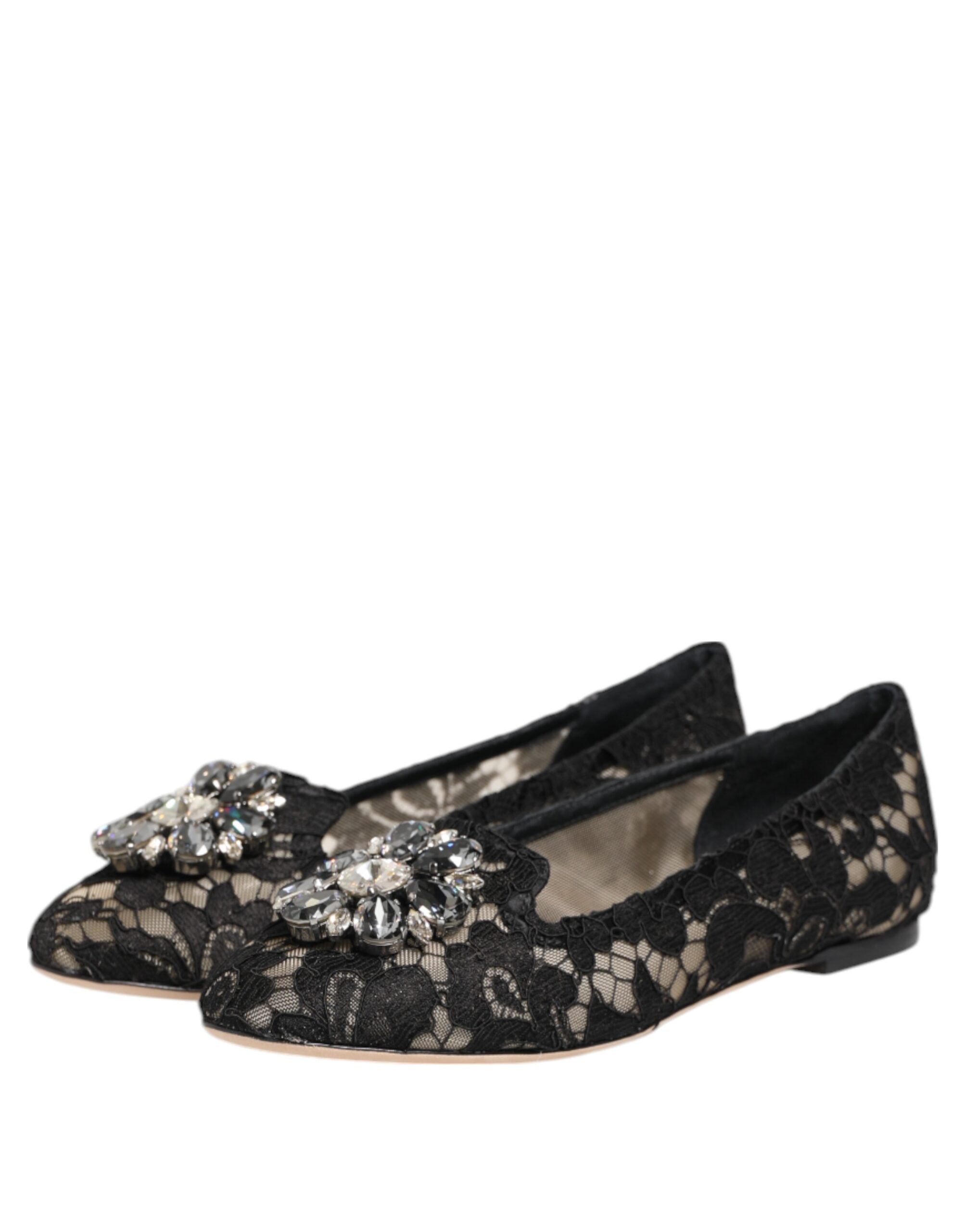 Indulge in the exquisite allure of Dolce & Gabbana's Black Taormina Lace Flats, where superior Italian craftsmanship meets timeless elegance, perfect for the discerning individual.