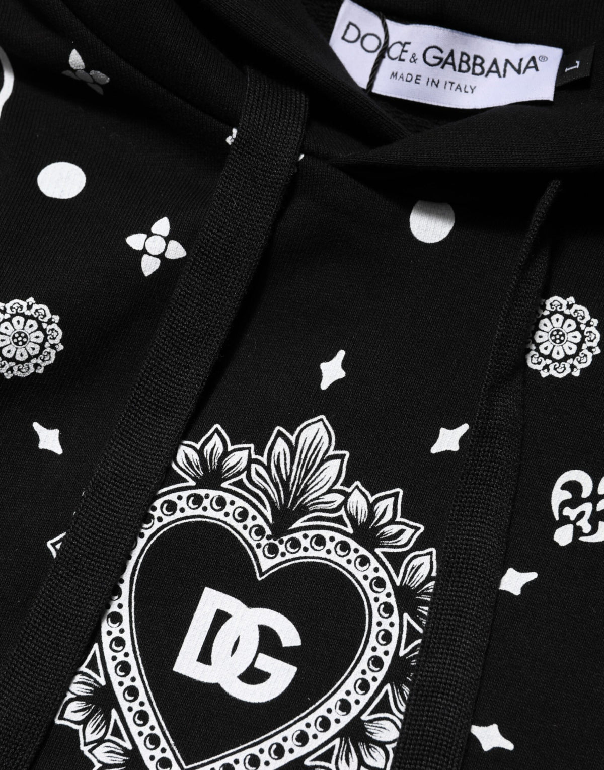 Indulge in the exquisite Dolce & Gabbana Black Bandana Hooded Sweatshirt, crafted from 100% cotton in Italy, merging timeless elegance with contemporary allure for the discerning individual.