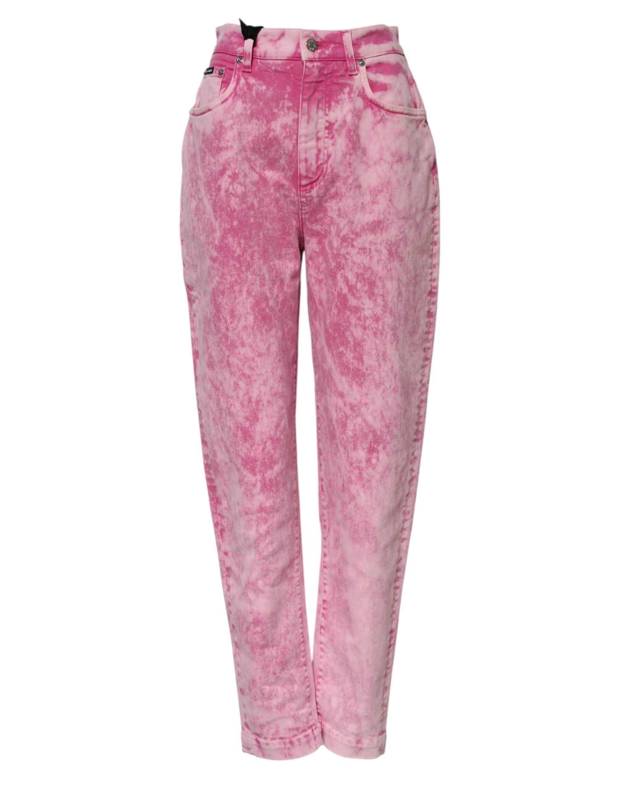Indulge in the exquisite Dolce & Gabbana Pink Tie Dye High Waist Tapered Denim Jeans, a luxurious blend of cotton and elastane, designed for the discerning individual who embodies elegance and confidence.