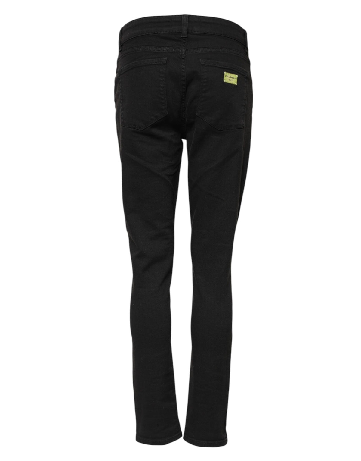 Indulge in the exquisite allure of Dolce & Gabbana's Black Cotton Skinny Mid Waist Denim Jeans, where Italian craftsmanship meets timeless elegance for the discerning individual.