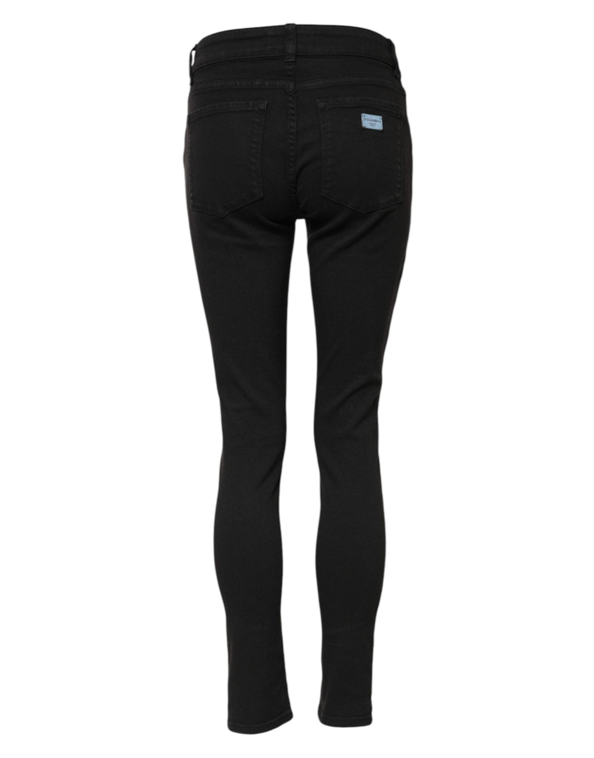 Indulge in the exquisite Dolce & Gabbana Black Cotton Skinny Mid Waist Jeans, where Italian craftsmanship meets timeless elegance for the discerning individual.
