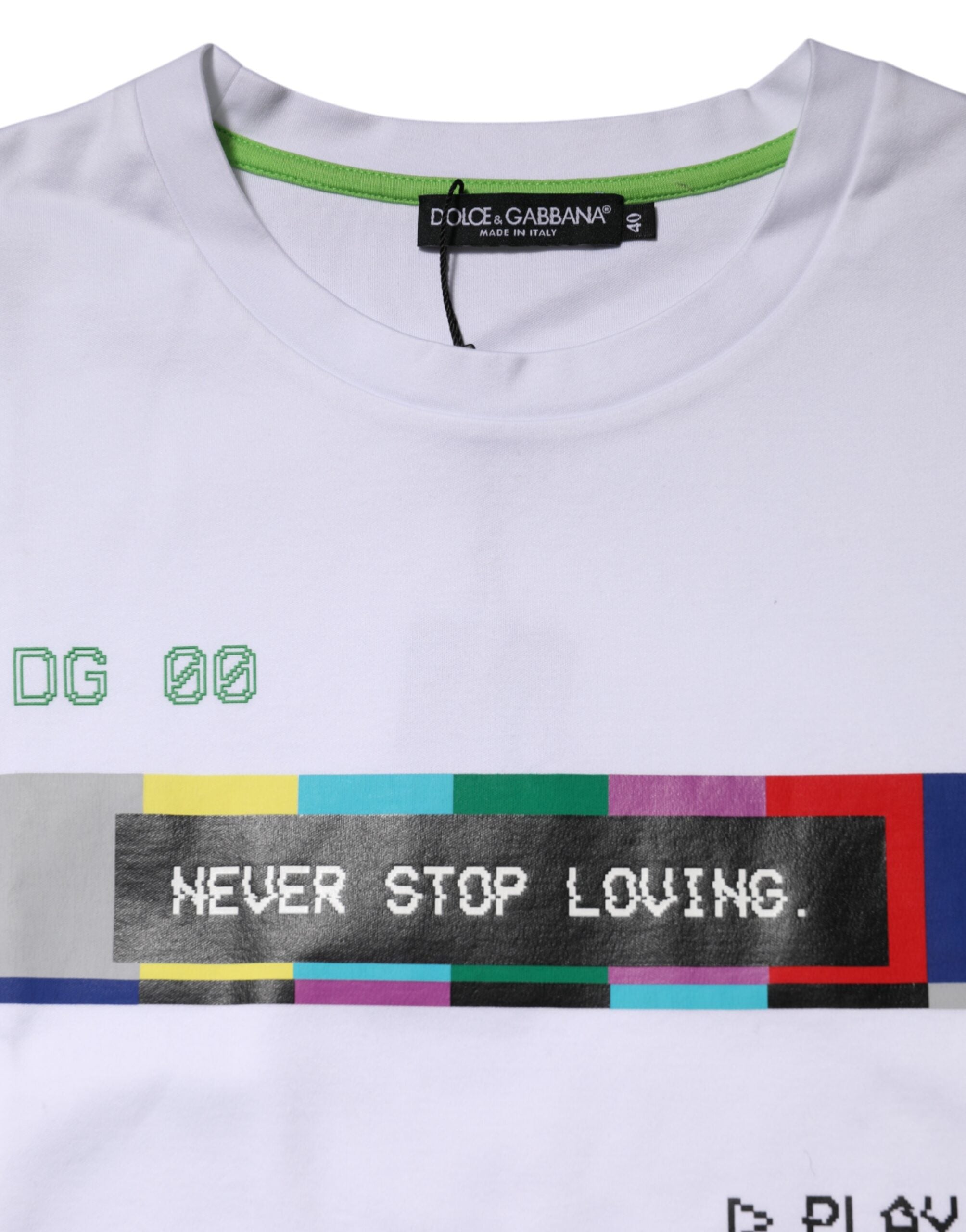 Experience the allure of Dolce & Gabbana's White Cotton Printed Short Sleeves T-shirt, a masterpiece of Italian craftsmanship that embodies elegance and sophistication for every occasion.