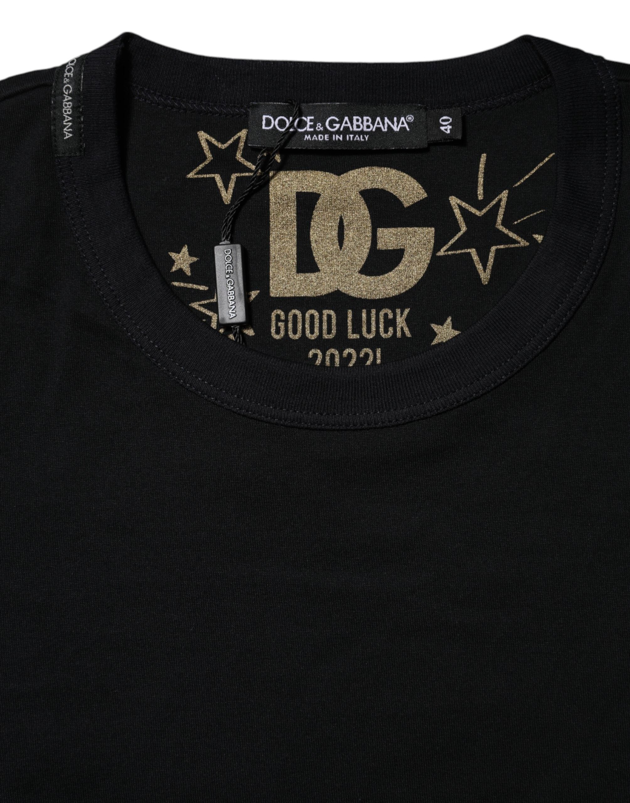 Indulge in the essence of luxury with the Dolce & Gabbana Black Cotton DG Print Short Sleeve Top, a masterpiece of Italian craftsmanship that elevates any wardrobe.