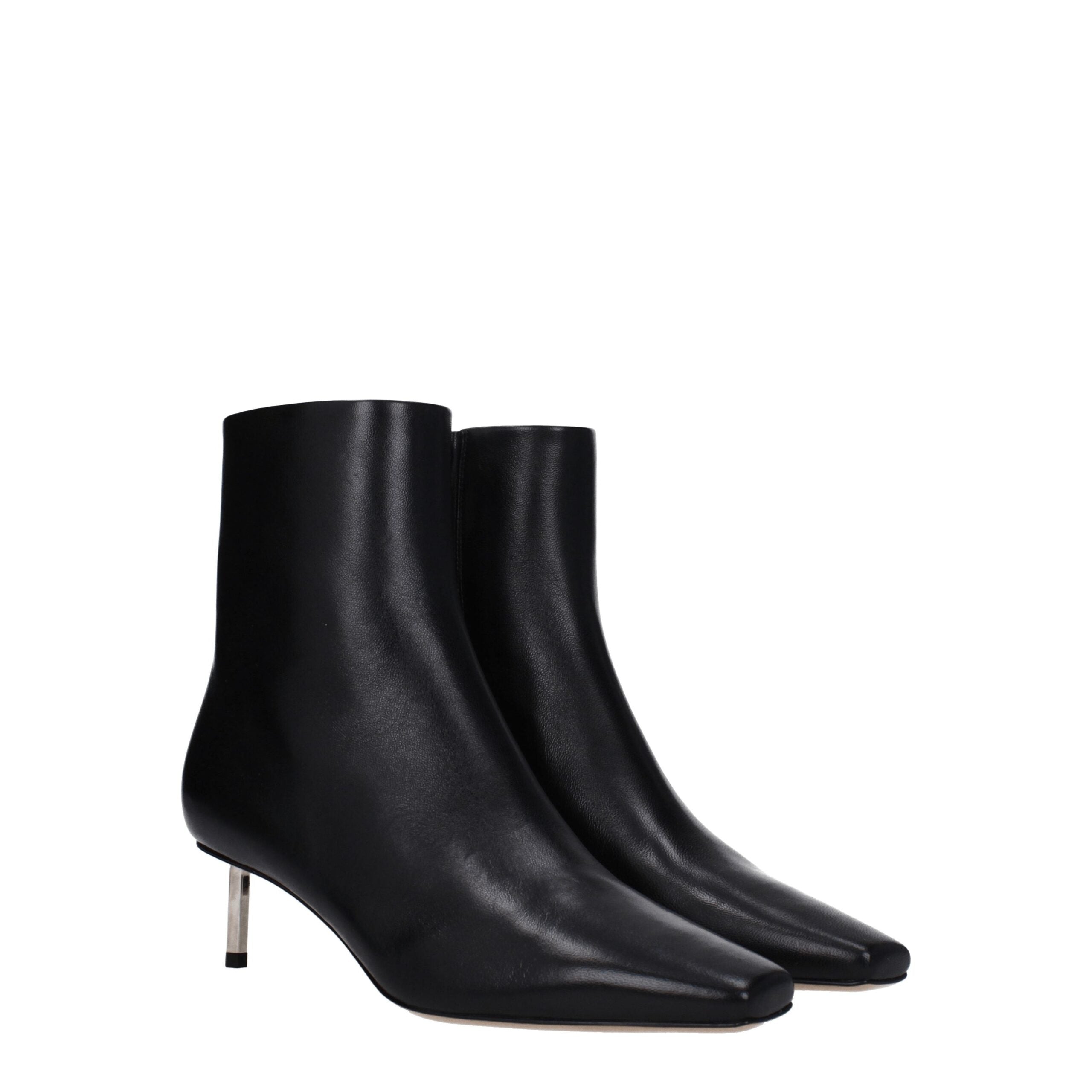 Step into timeless elegance with Off-White Black Leather Ankle Boots, crafted from premium leather for a sophisticated silhouette that embodies luxury and confidence.