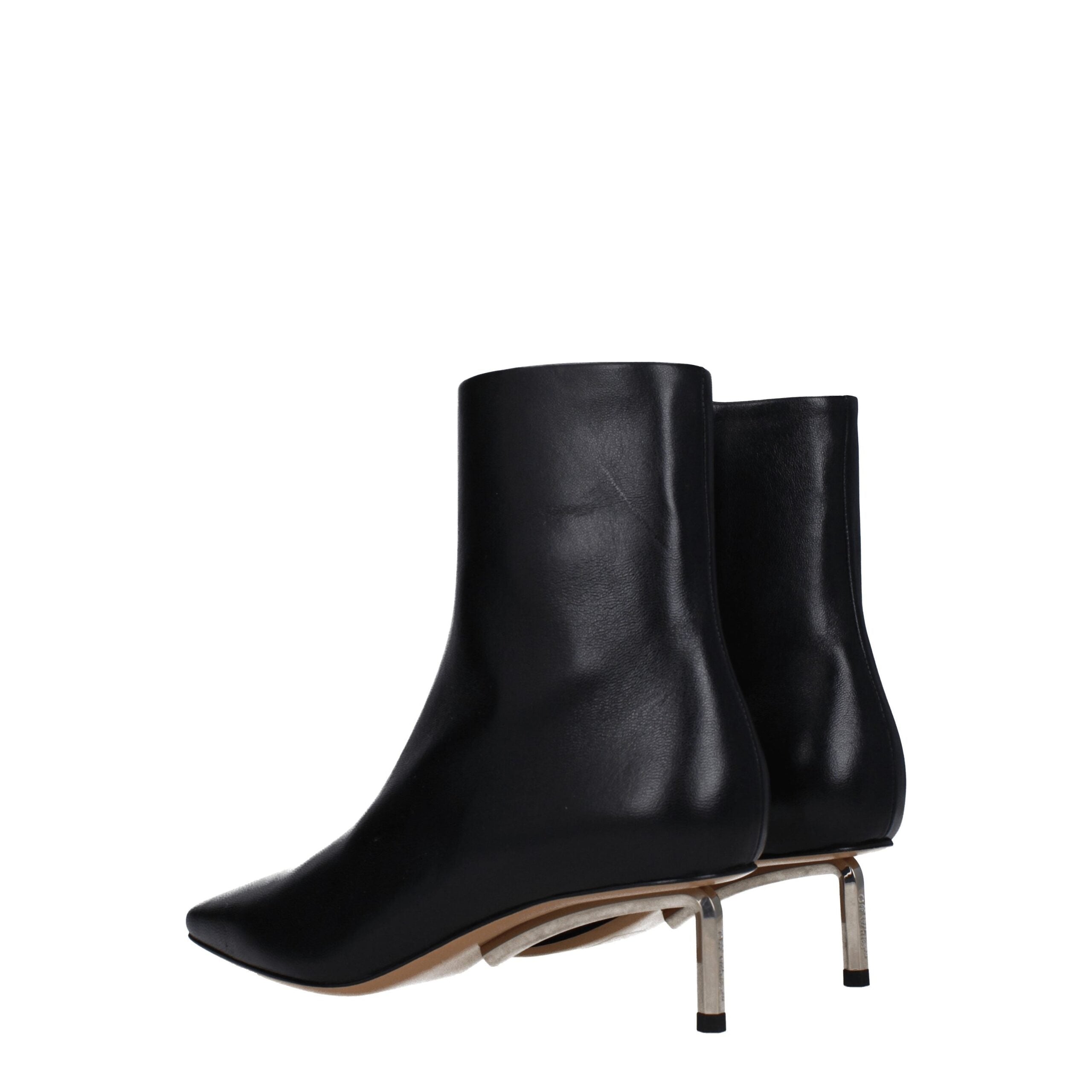Elevate your style with Off-White Black Leather Ankle Boots, a masterpiece of premium craftsmanship that embodies timeless elegance and modern sophistication.