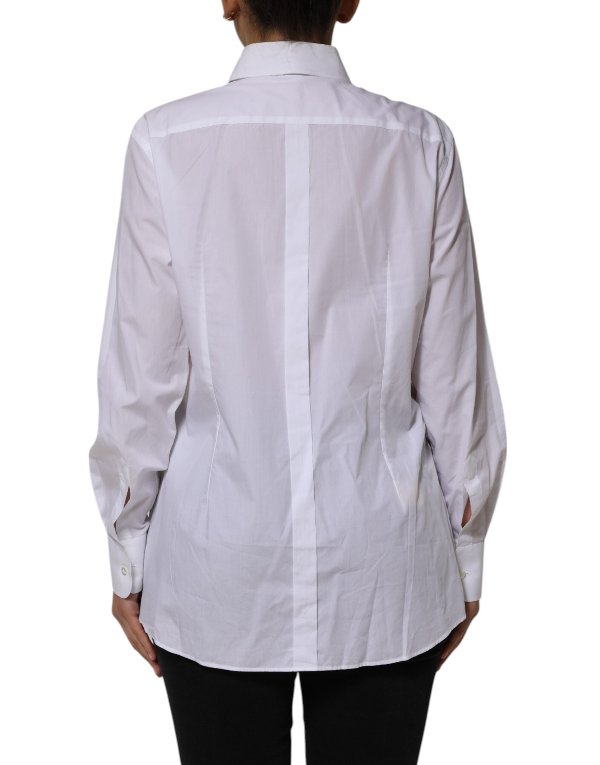 Indulge in the timeless elegance of the Dolce & Gabbana White Cotton Collared Long Sleeves Shirt Top, a luxurious embodiment of Italian craftsmanship and sophisticated allure.