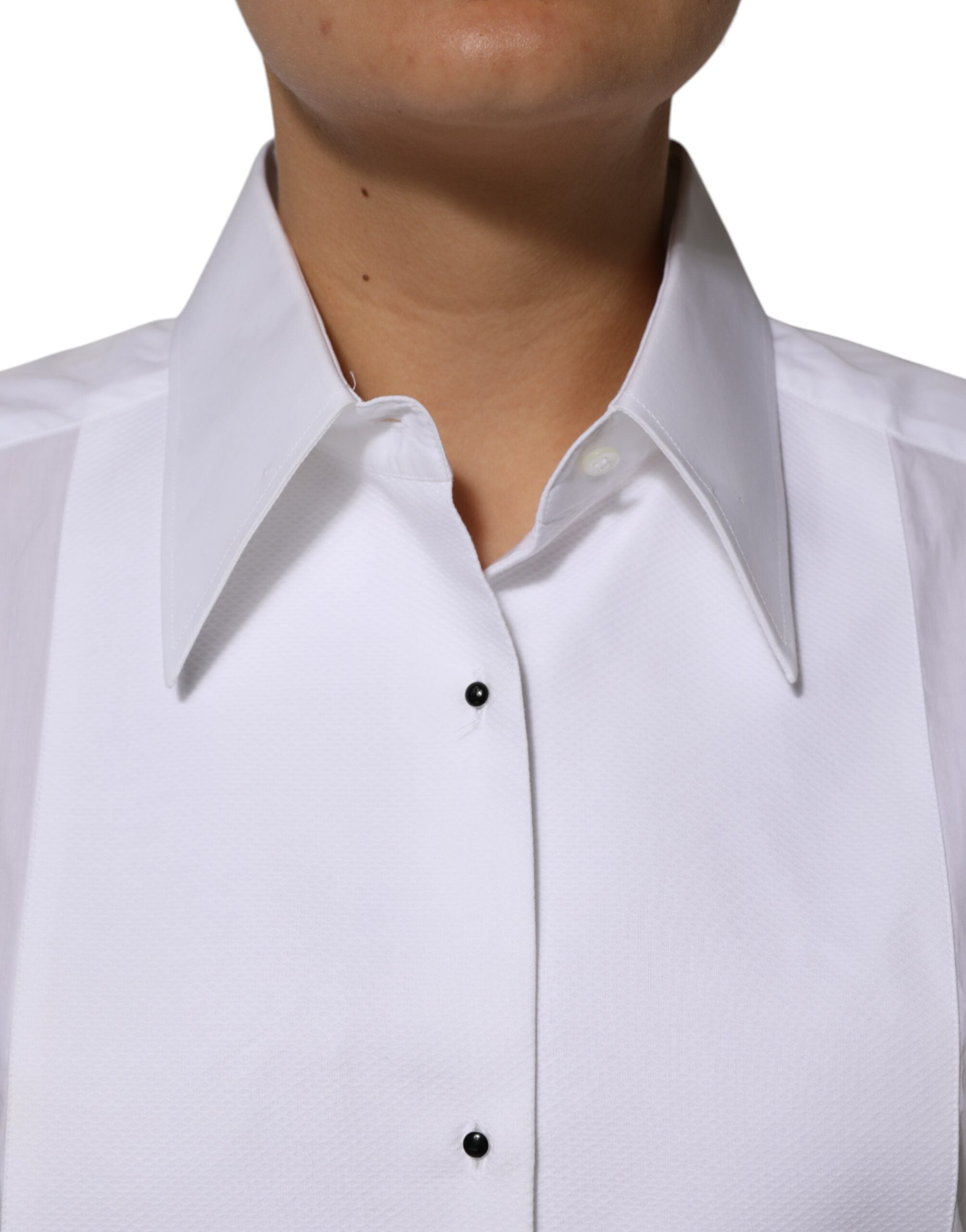 Indulge in the timeless elegance of Dolce & Gabbana's White Cotton Collared Long Sleeves Shirt Top, a luxurious embodiment of Italian craftsmanship and refined sophistication.