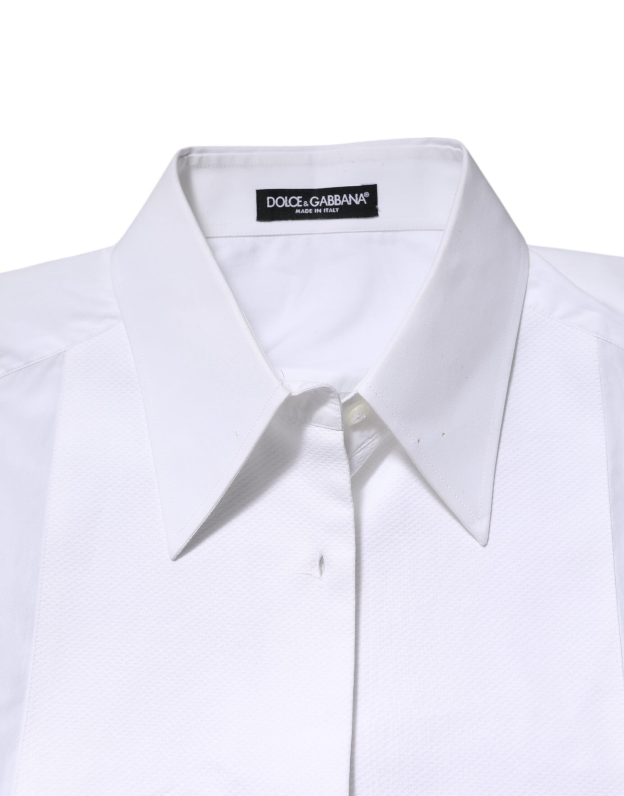 Experience the allure of Dolce & Gabbana's White Cotton Collared Long Sleeves Shirt Top, a timeless embodiment of Italian craftsmanship and luxurious elegance.