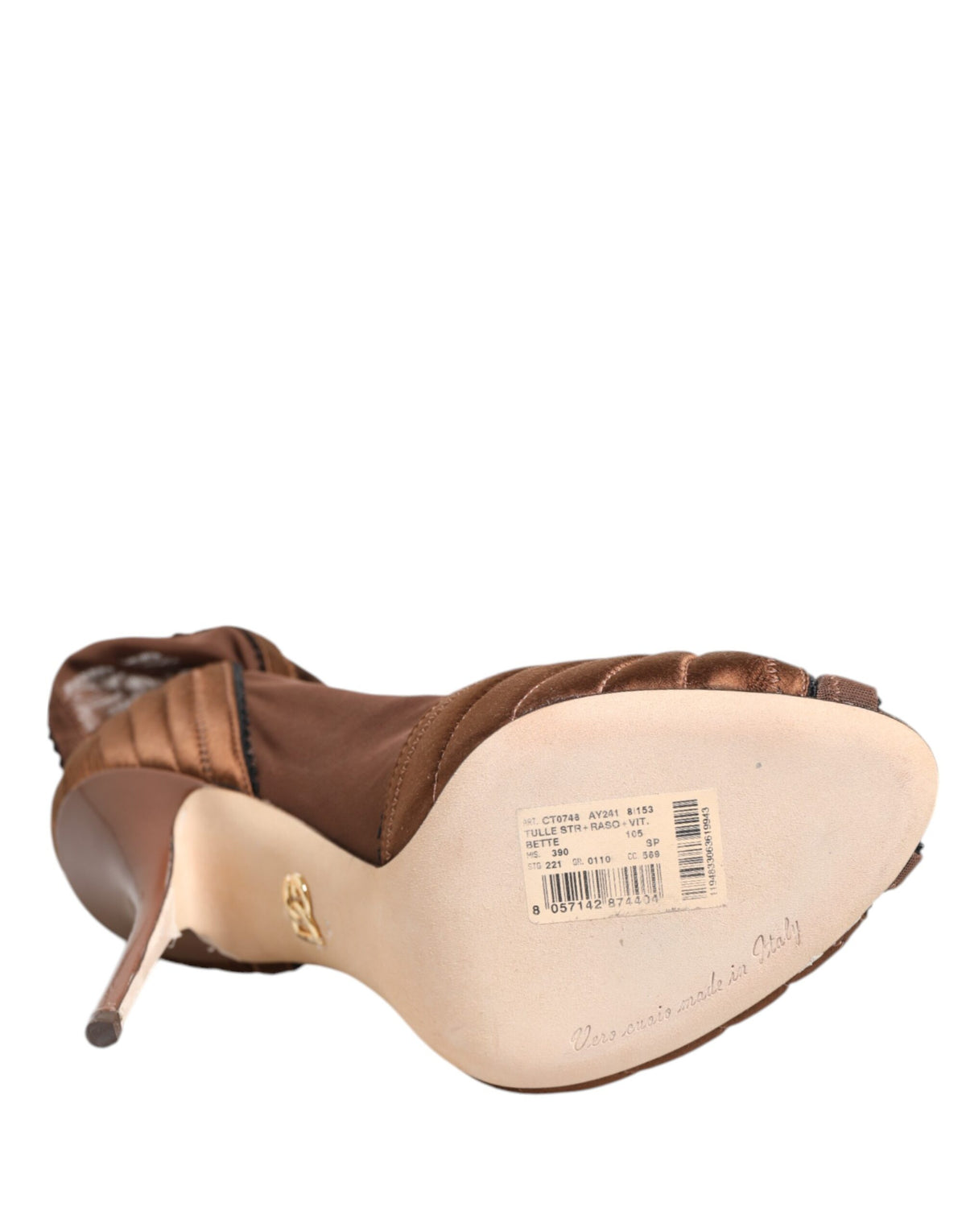 Discover the exquisite Dolce & Gabbana Brown Bette High Heeled Ankle Boots, a luxurious blend of silk and calfskin, embodying timeless elegance and refined craftsmanship.