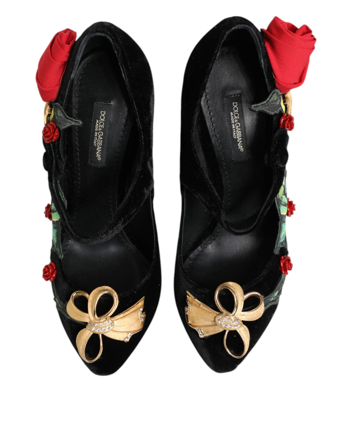 Step into elegance with Dolce & Gabbana's Black Roses Crystal Brooch Mary Jane Shoes, crafted from luxurious rayon and silk, embodying timeless sophistication and artistry.