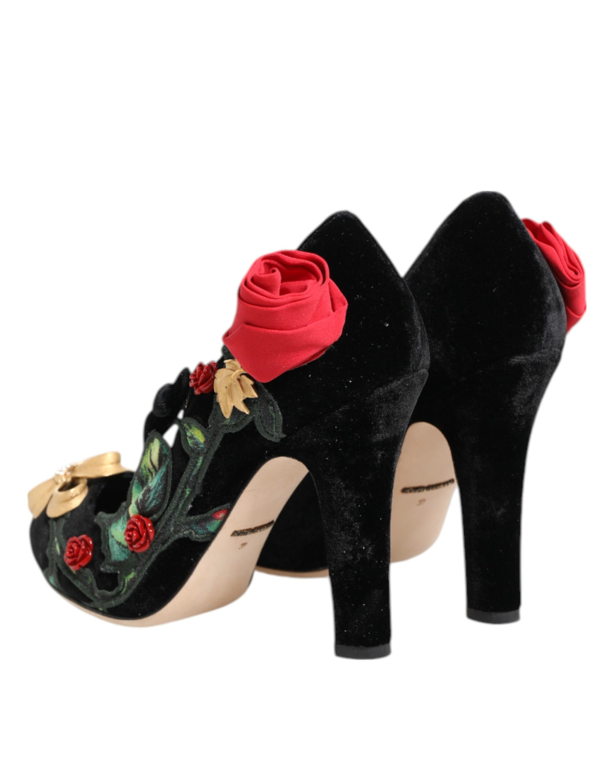 Step into timeless elegance with Dolce & Gabbana's Black Roses Crystal Brooch Mary Jane Shoes, where exquisite craftsmanship meets luxurious materials for the discerning individual.