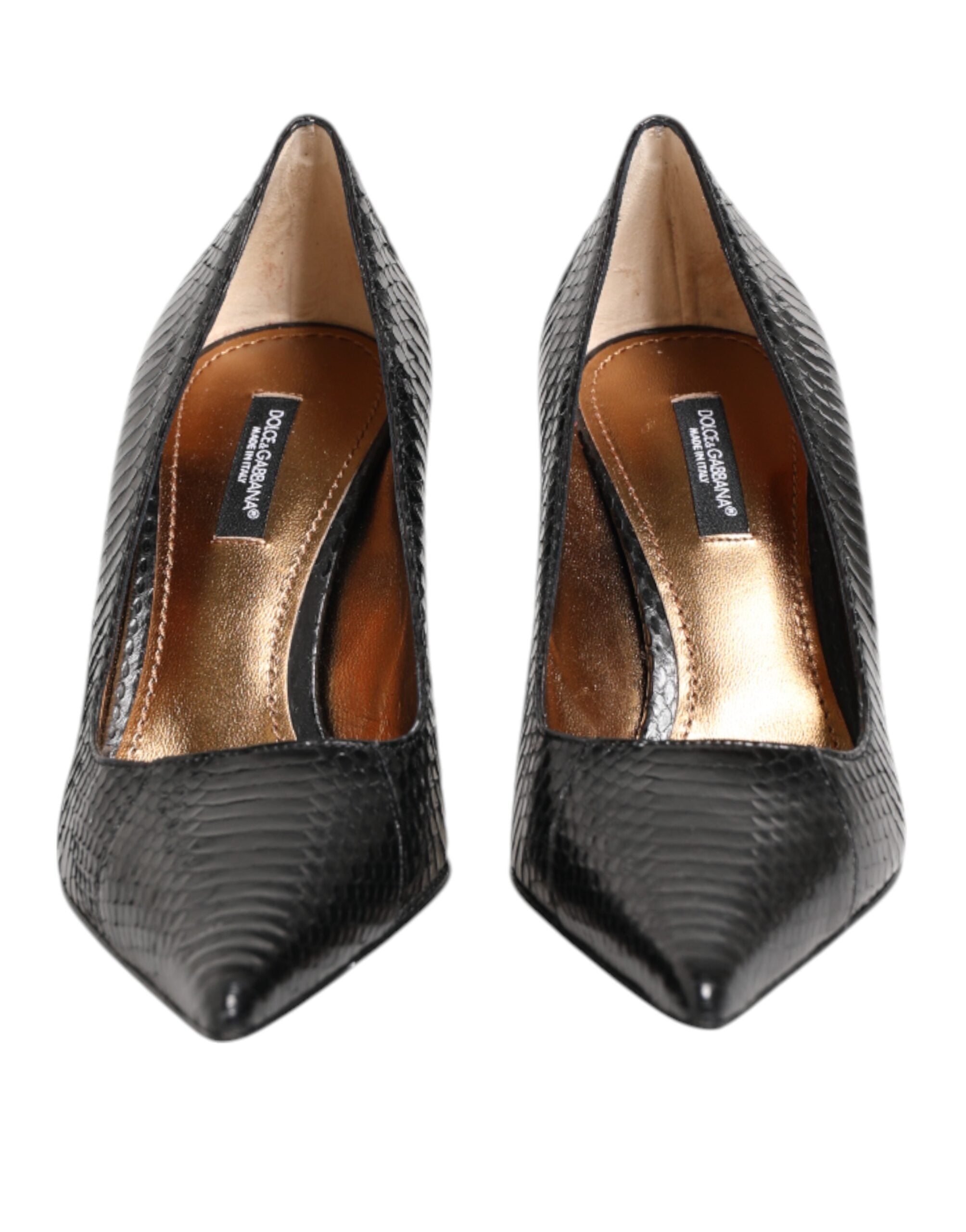 Experience unparalleled sophistication with Dolce & Gabbana's Black Exotic Leather Stiletto Pumps, crafted from luxurious python leather for timeless elegance.