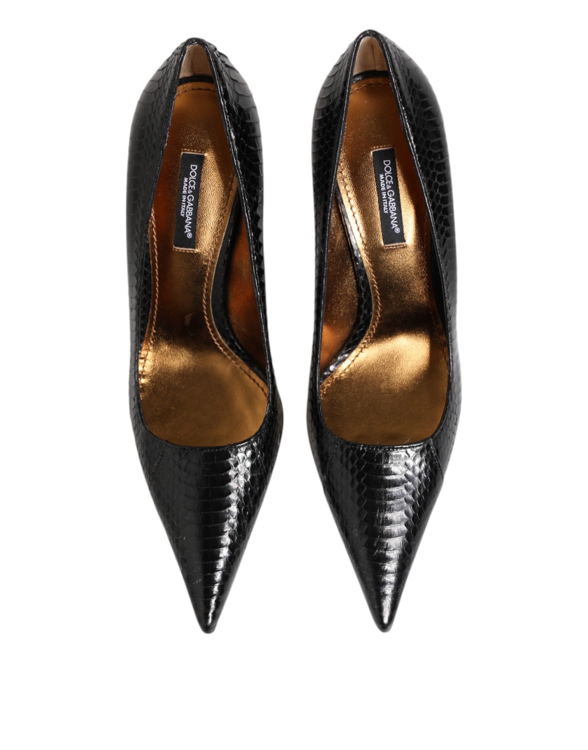 Elevate your elegance with Dolce & Gabbana's Black Exotic Leather Stiletto Pumps, crafted from luxurious python leather for a timeless statement of sophistication.