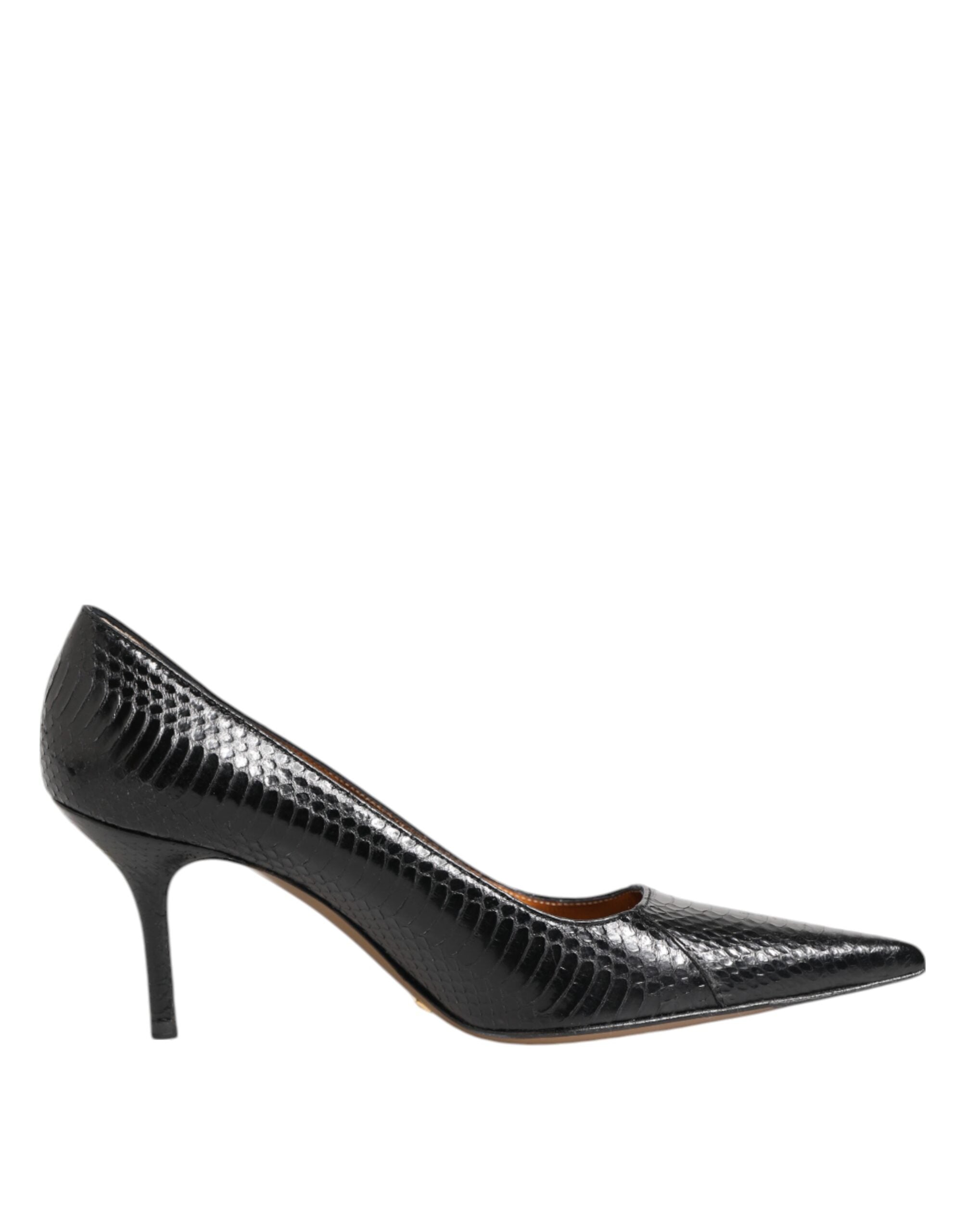 Indulge in the exquisite allure of Dolce & Gabbana's Black Exotic Leather Stiletto Pumps, crafted from luxurious python leather for a statement of refined sophistication.