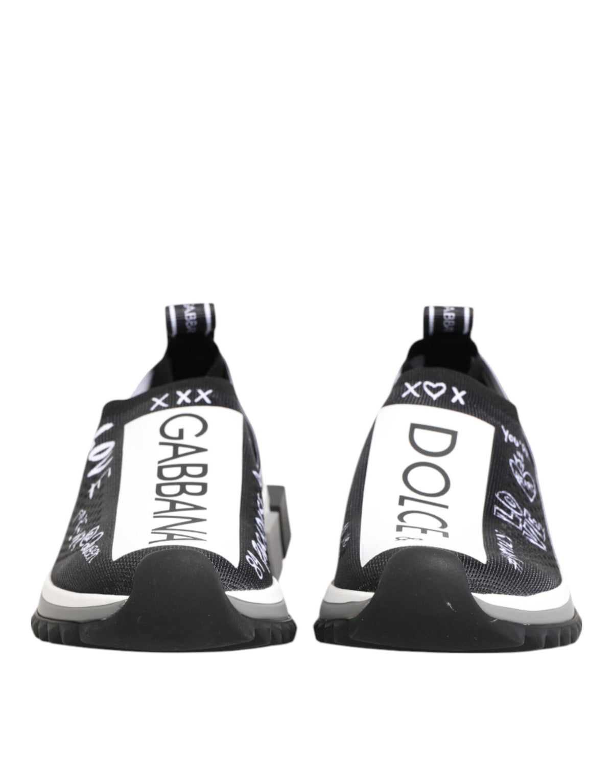 Step into unparalleled elegance with Dolce & Gabbana's Black White Sorrento Low Top Sneakers, crafted from premium materials for a luxurious blend of comfort and style.