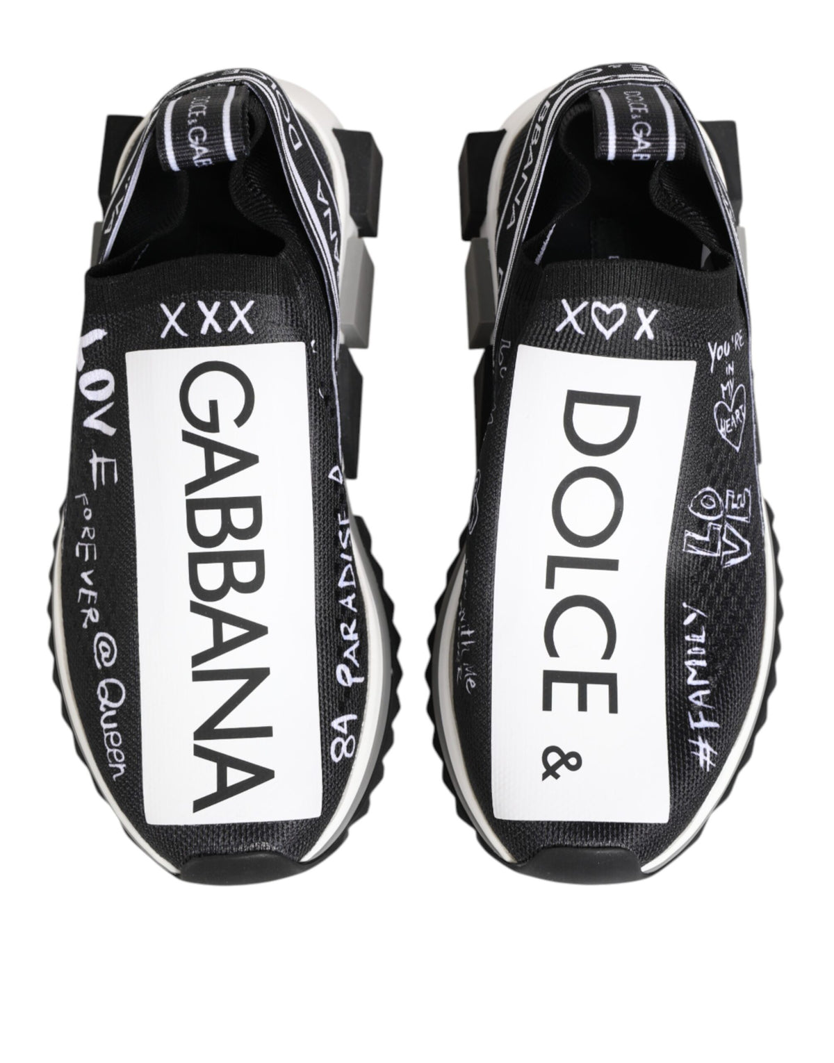 Step into elegance with Dolce & Gabbana's Black White Sorrento Low Top Sneakers, crafted from premium materials for a luxurious blend of comfort and style.