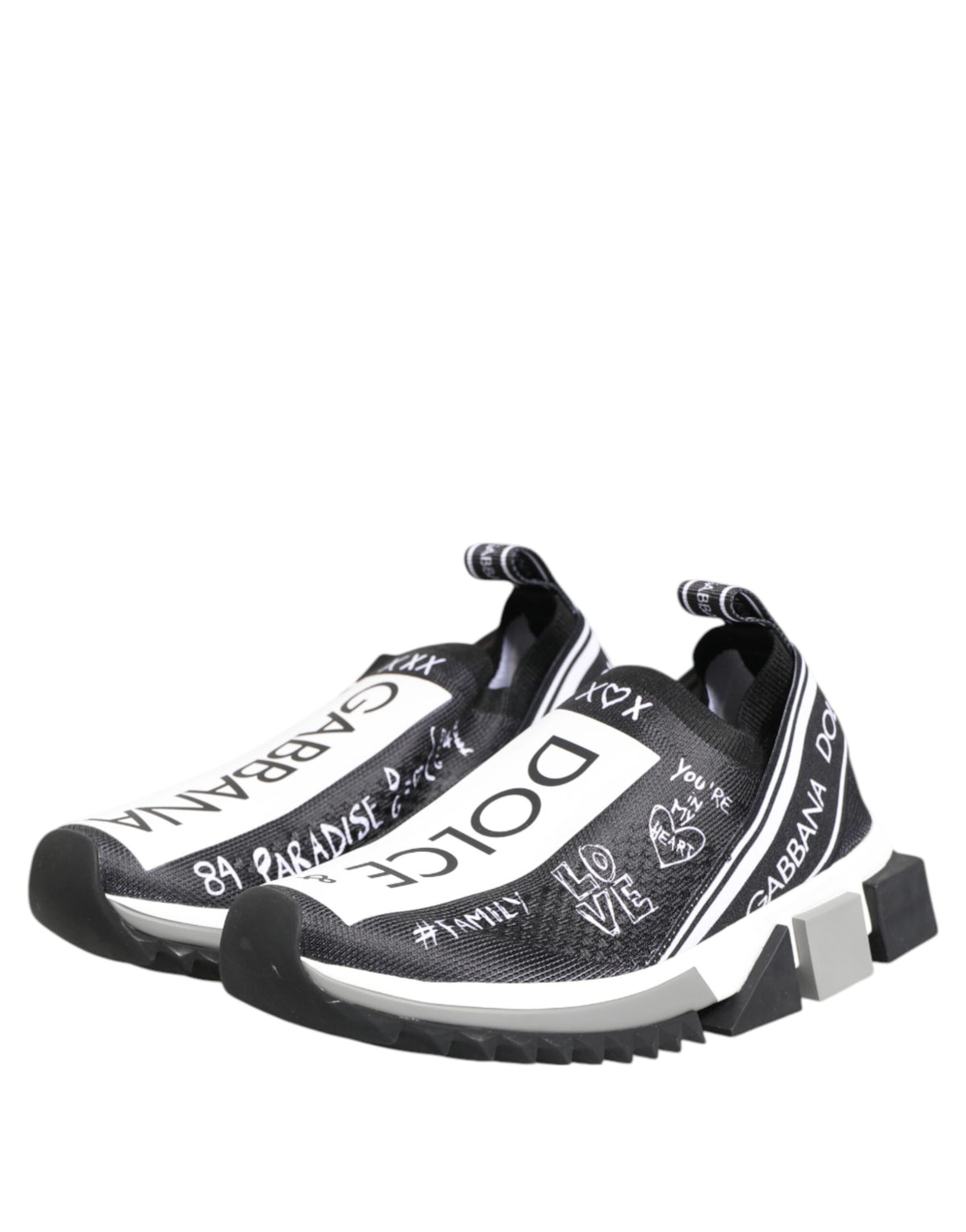 Step into luxury with Dolce & Gabbana's Black White Sorrento Low Top Sneakers, crafted from premium materials for an exquisite blend of style and comfort.