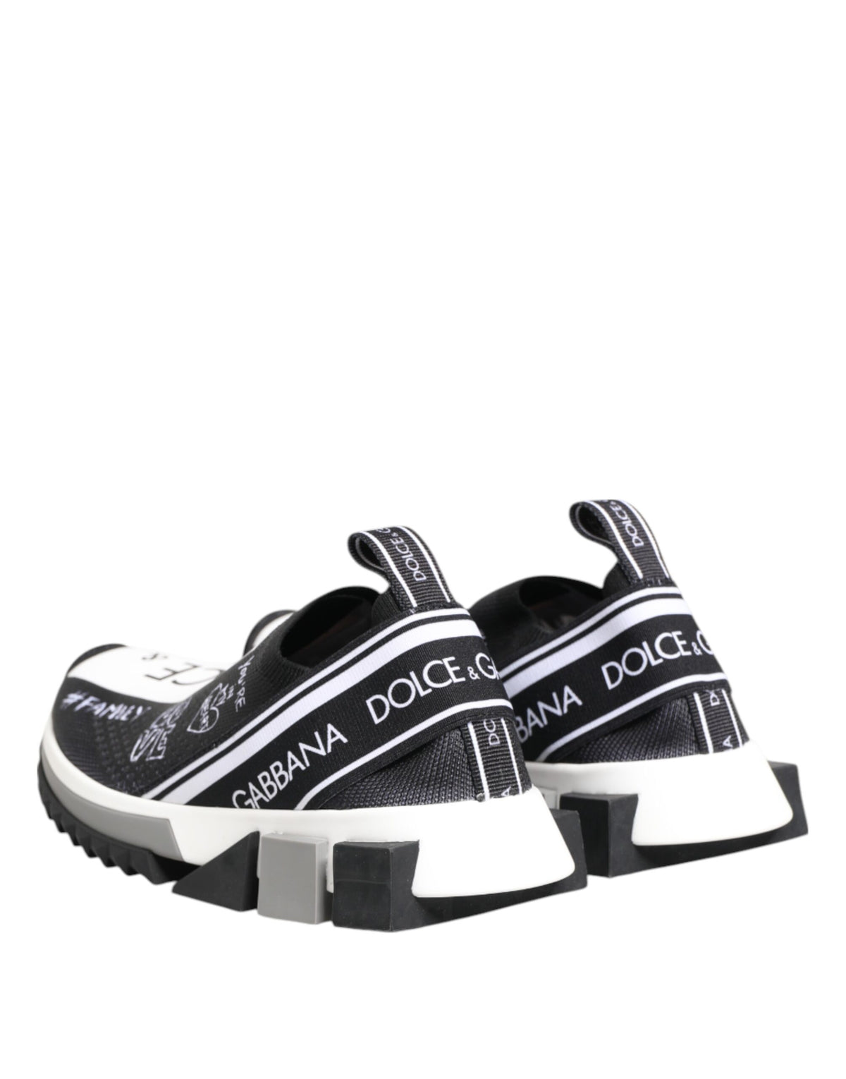 Step into a world of elegance with Dolce & Gabbana's Black White Sorrento Low Top Sneakers, crafted from premium materials for an exquisite blend of comfort and style.