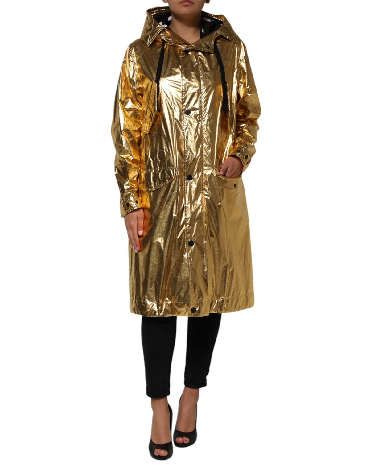 Indulge in the opulence of the Dolce & Gabbana Gold Hooded Long Sleeves Trench Coat, a masterpiece of Italian craftsmanship that redefines luxury and sophistication.