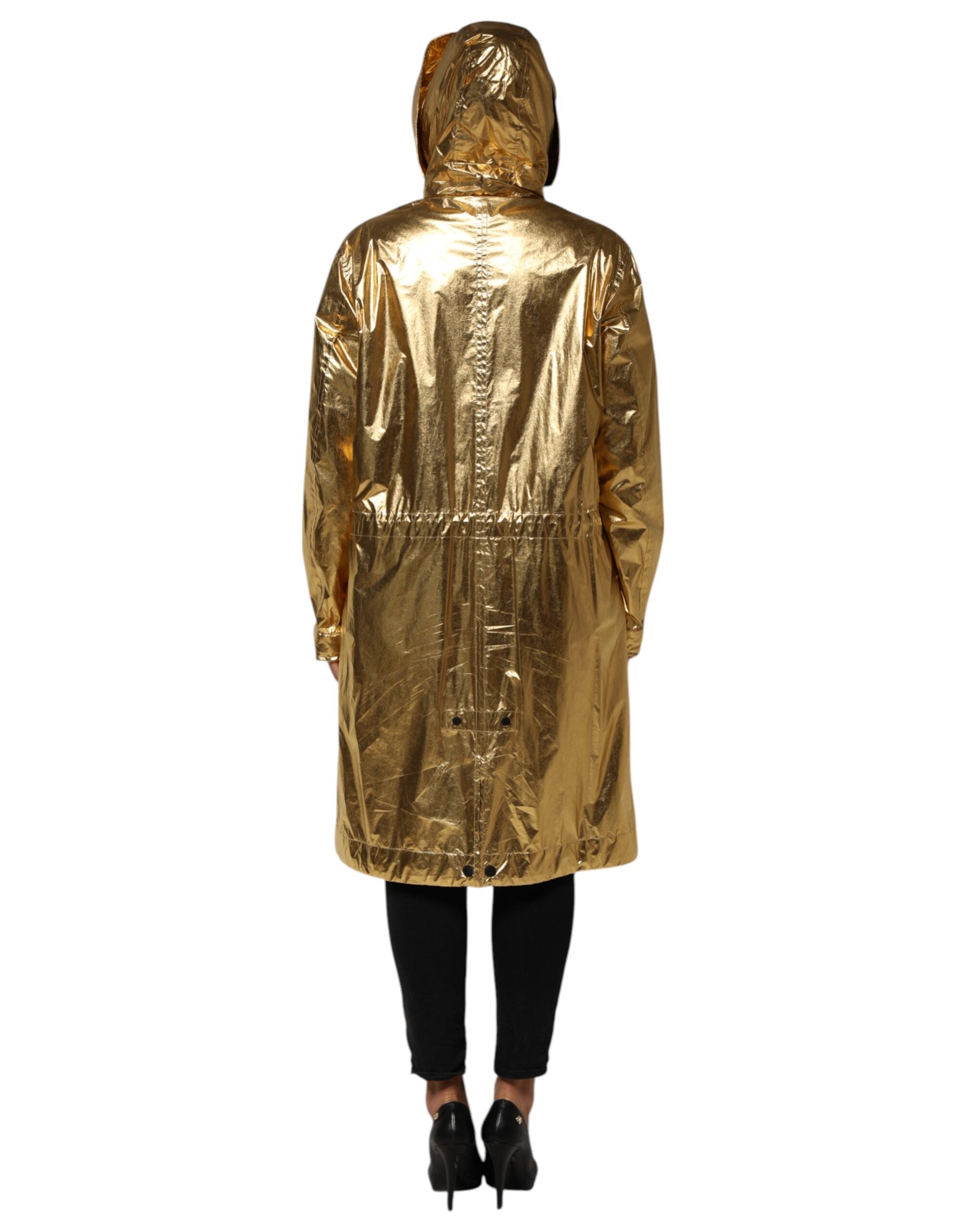 Indulge in the exquisite Dolce & Gabbana Gold Hooded Long Sleeves Trench Coat, a masterpiece of Italian craftsmanship that radiates timeless luxury and sophistication.