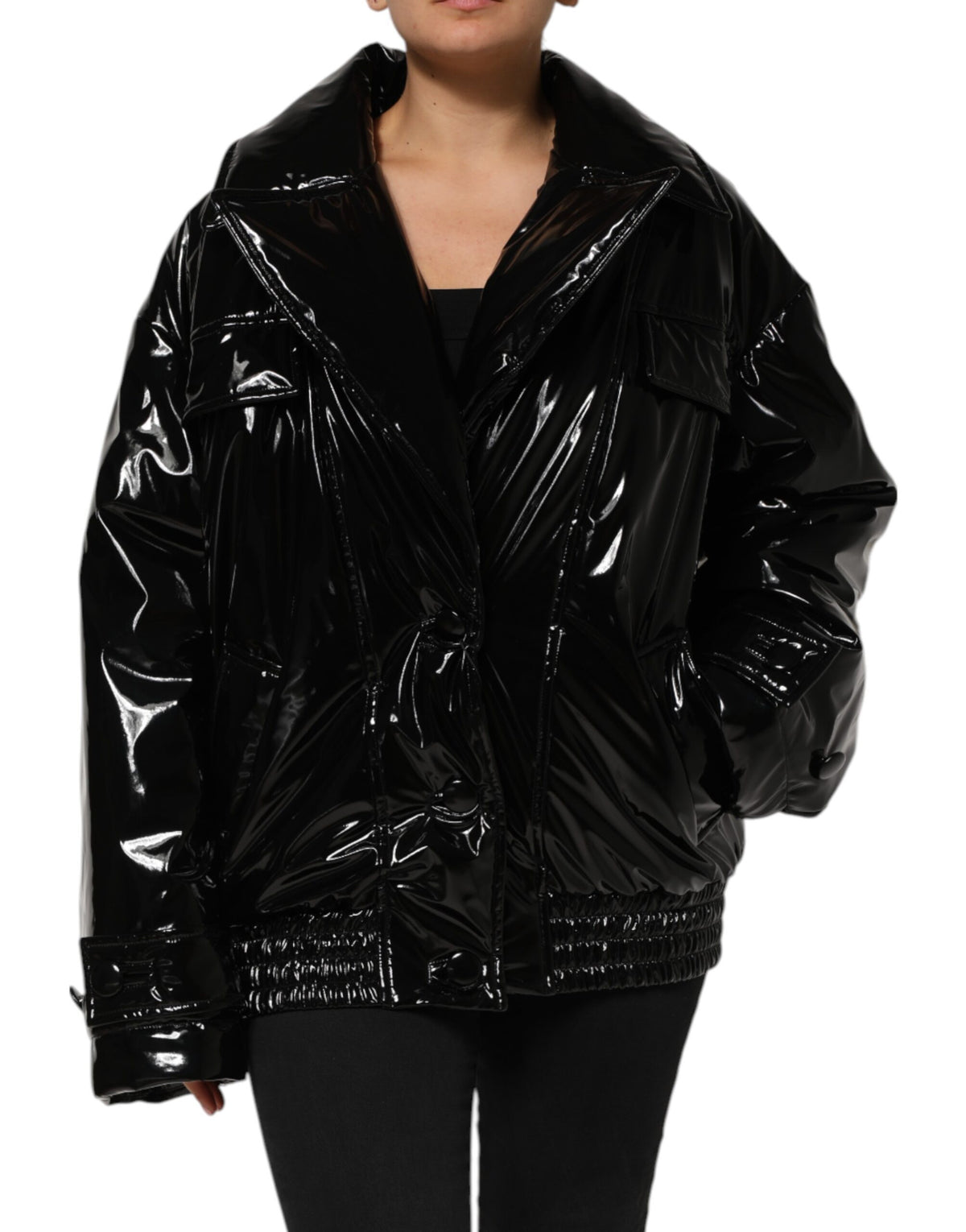 Indulge in the exquisite Dolce & Gabbana Black Quilted Puffer Coat, a masterpiece of Italian craftsmanship that seamlessly merges warmth with sophisticated allure for the discerning individual.