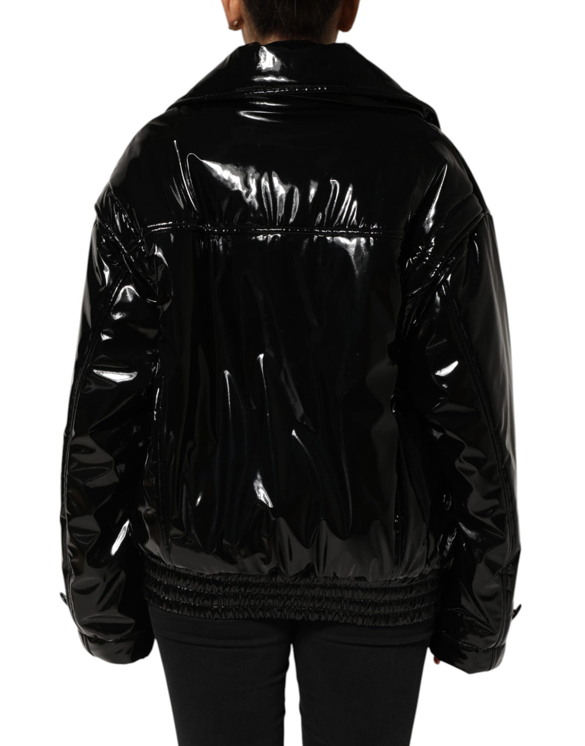 Discover the Dolce & Gabbana Black Quilted Puffer Coat, a masterpiece of Italian craftsmanship that embodies luxury and sophistication for the discerning individual.