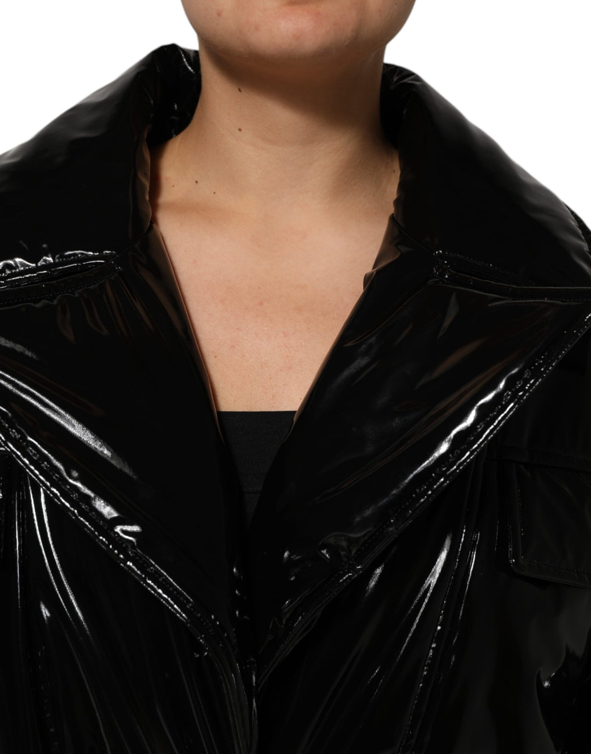 Indulge in the exquisite Dolce & Gabbana Black Quilted Puffer Coat, a masterpiece of Italian craftsmanship that embodies luxury and sophistication for every occasion.